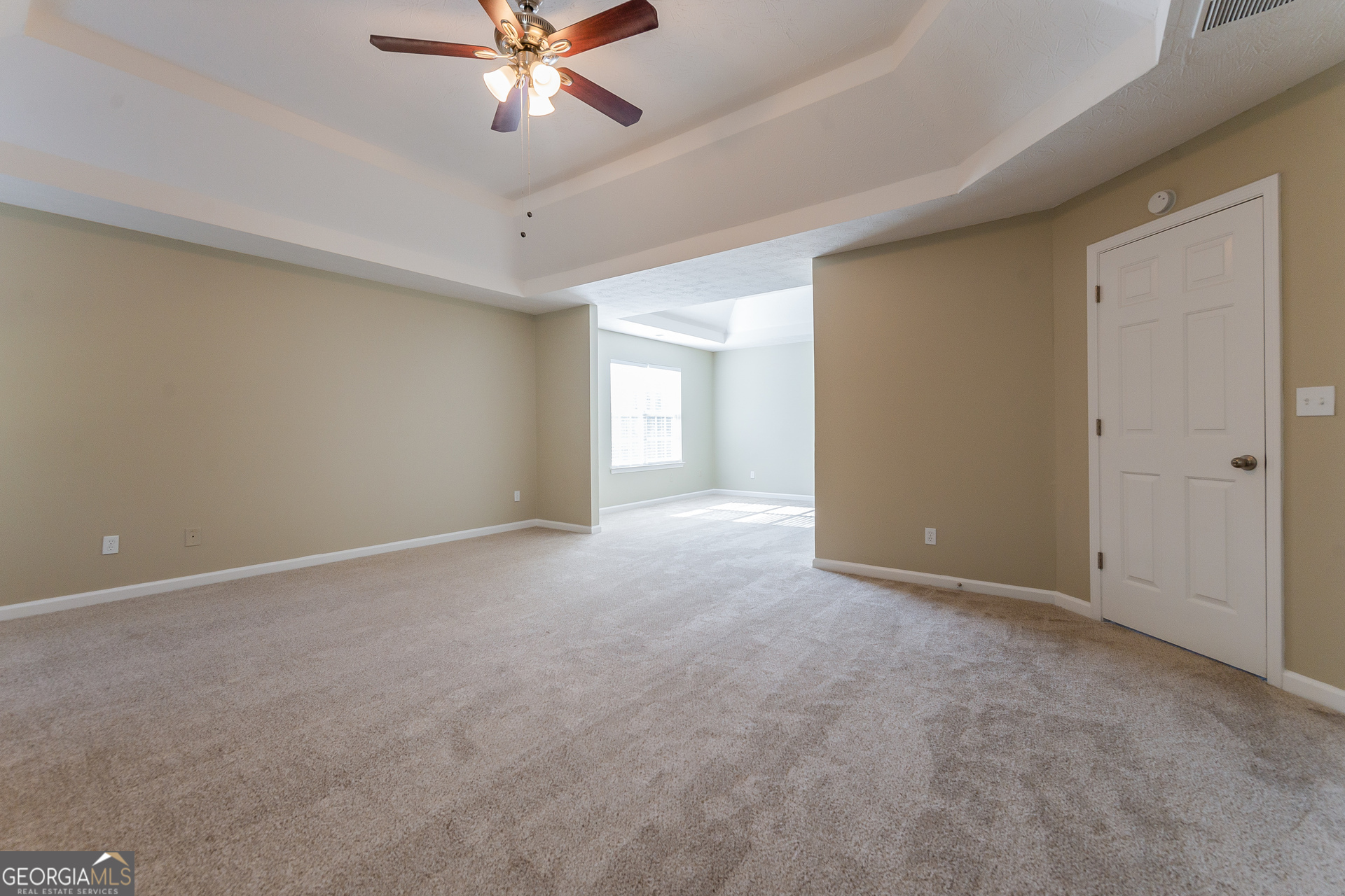 231 Biltmore Way Stockbridge, GA 30281 - Photo 11 of 15 a view of an empty room with a ceiling fan