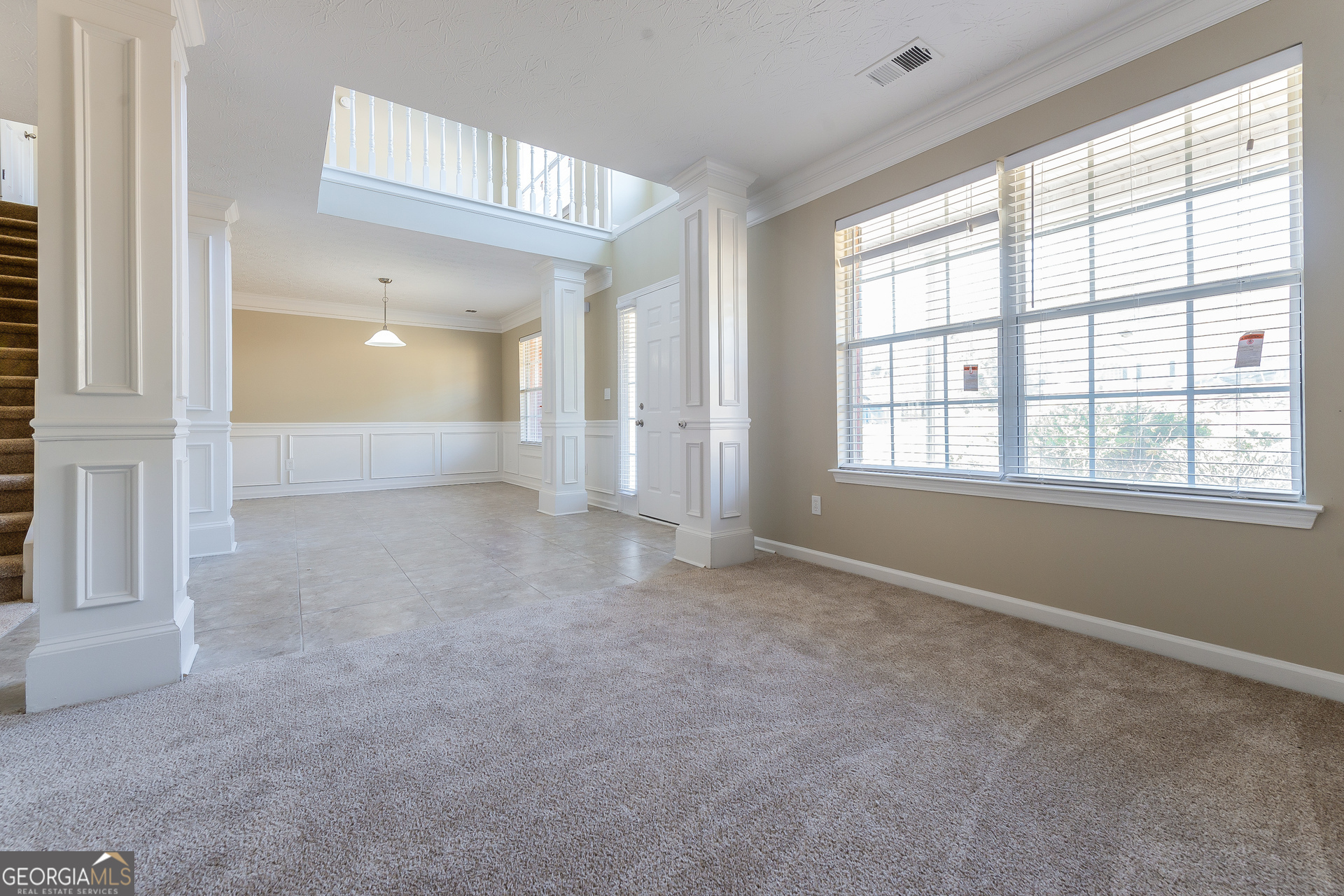 231 Biltmore Way Stockbridge, GA 30281 - Photo 13 of 15 a view of an empty room with a window
