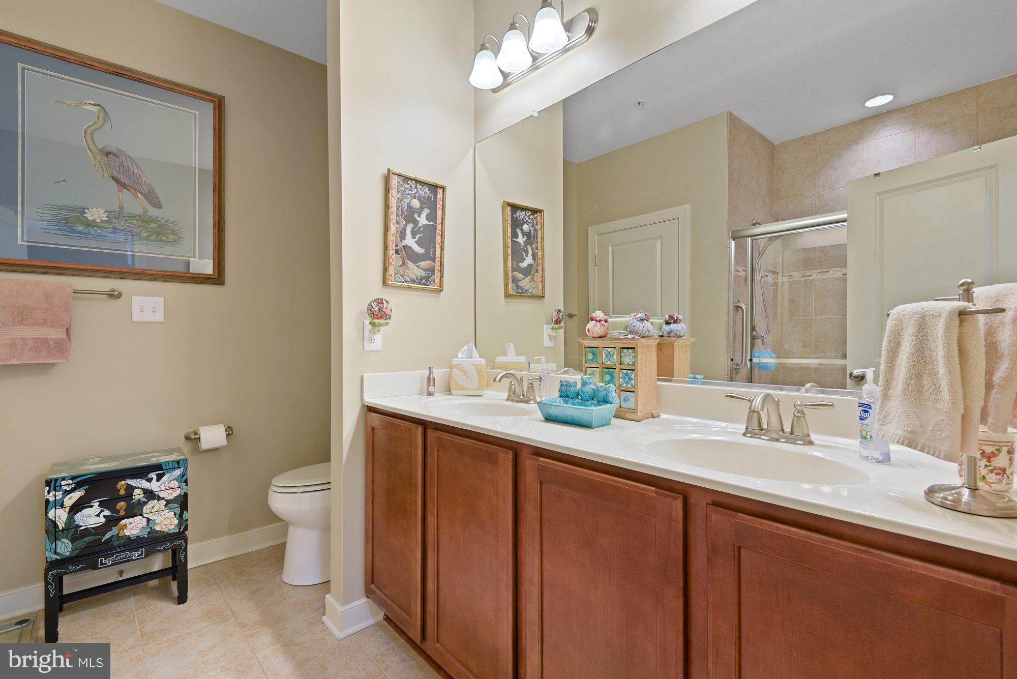 22 Trail Ride Drive, Unit 434 Taneytown, MD 21787 - Photo 12 of 35 Primary bath with walk-in shower & double vanity.