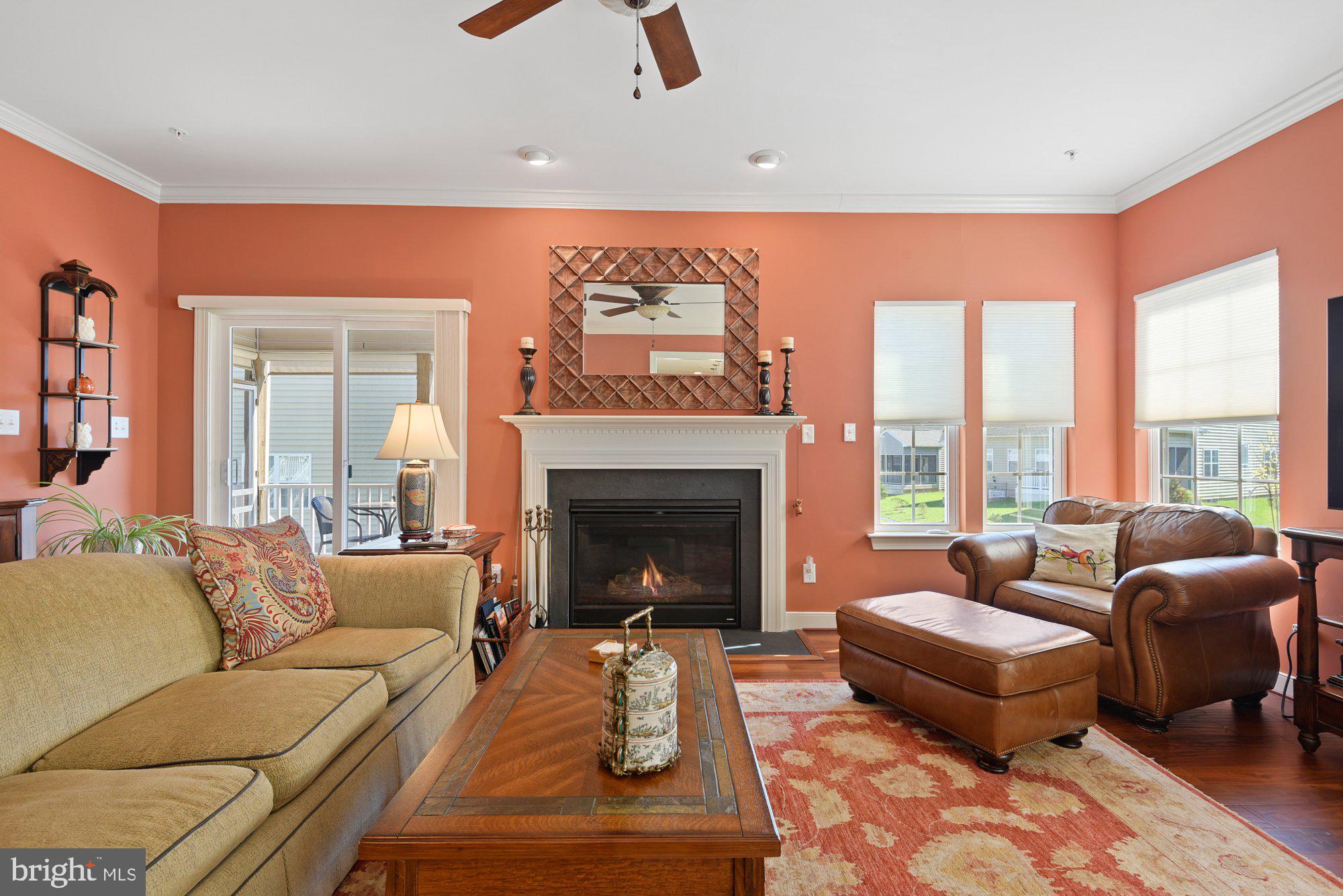 22 Trail Ride Drive, Unit 434 Taneytown, MD 21787 - Photo 6 of 35 Spacious living room w/cozy gas fireplace