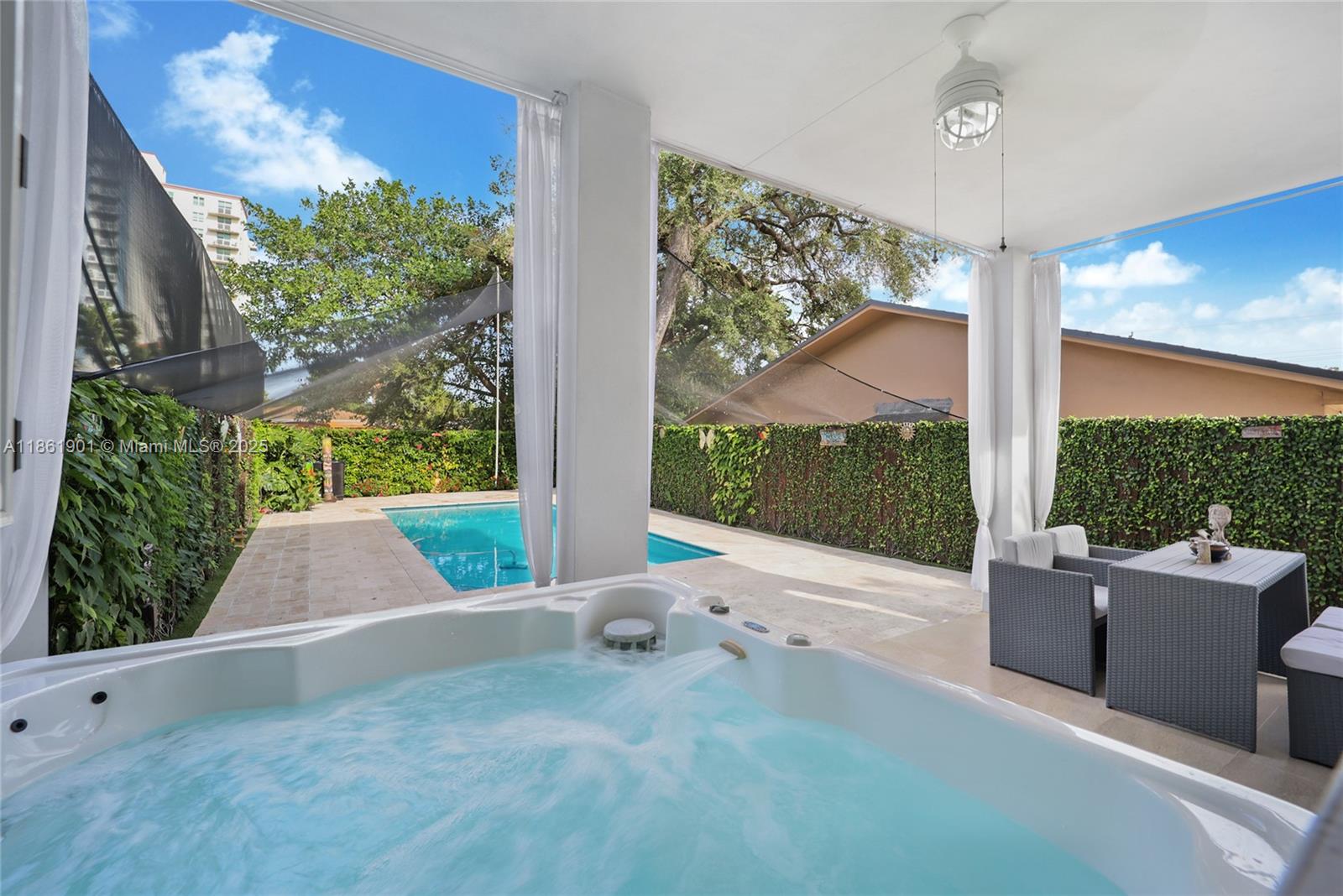 2943 Southwest 23rd Street Miami, FL 33145 - Photo 16 of 21 a view of backyard with a garden and plants