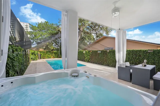 a view of backyard with a garden and plants