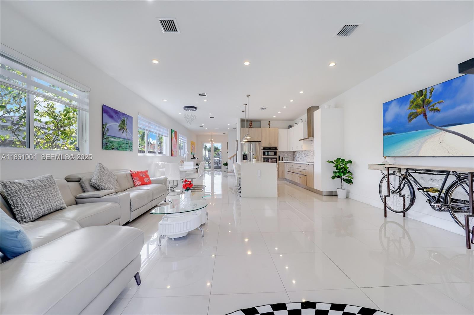 2943 Southwest 23rd Street Miami, FL 33145 - Photo 5 of 21 a living room with furniture and a table