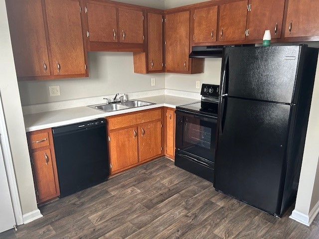 292 Raleigh Drive, Unit 3D Clarksville, TN 37043 - Photo 2 of 7 a kitchen with stainless steel appliances granite countertop a refrigerator and a sink