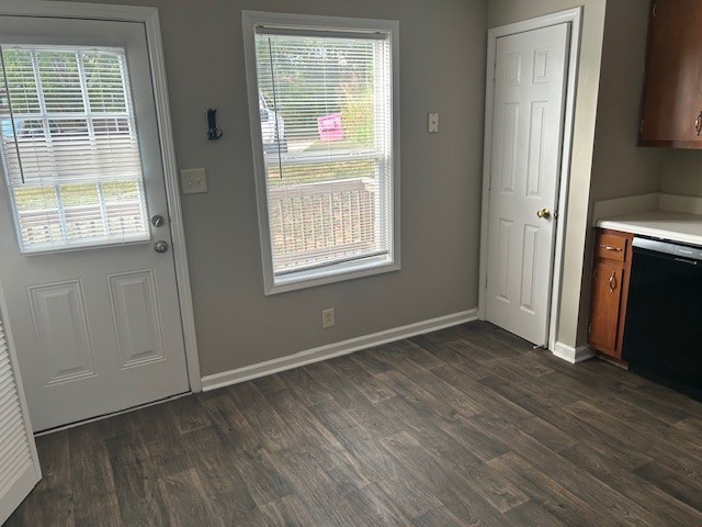 292 Raleigh Drive, Unit 3D Clarksville, TN 37043 - Photo 3 of 7 an empty room with wooden floor and windows