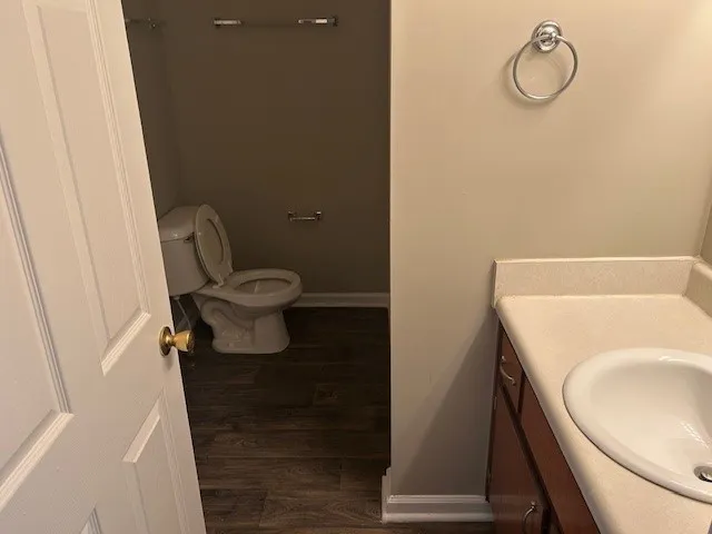 a bathroom with a toilet and a sink