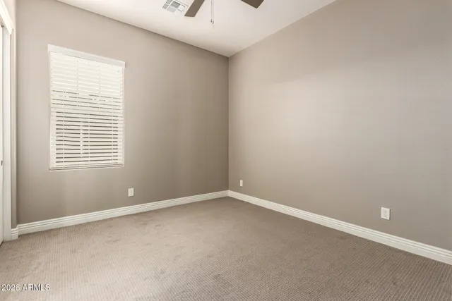 an empty room with window