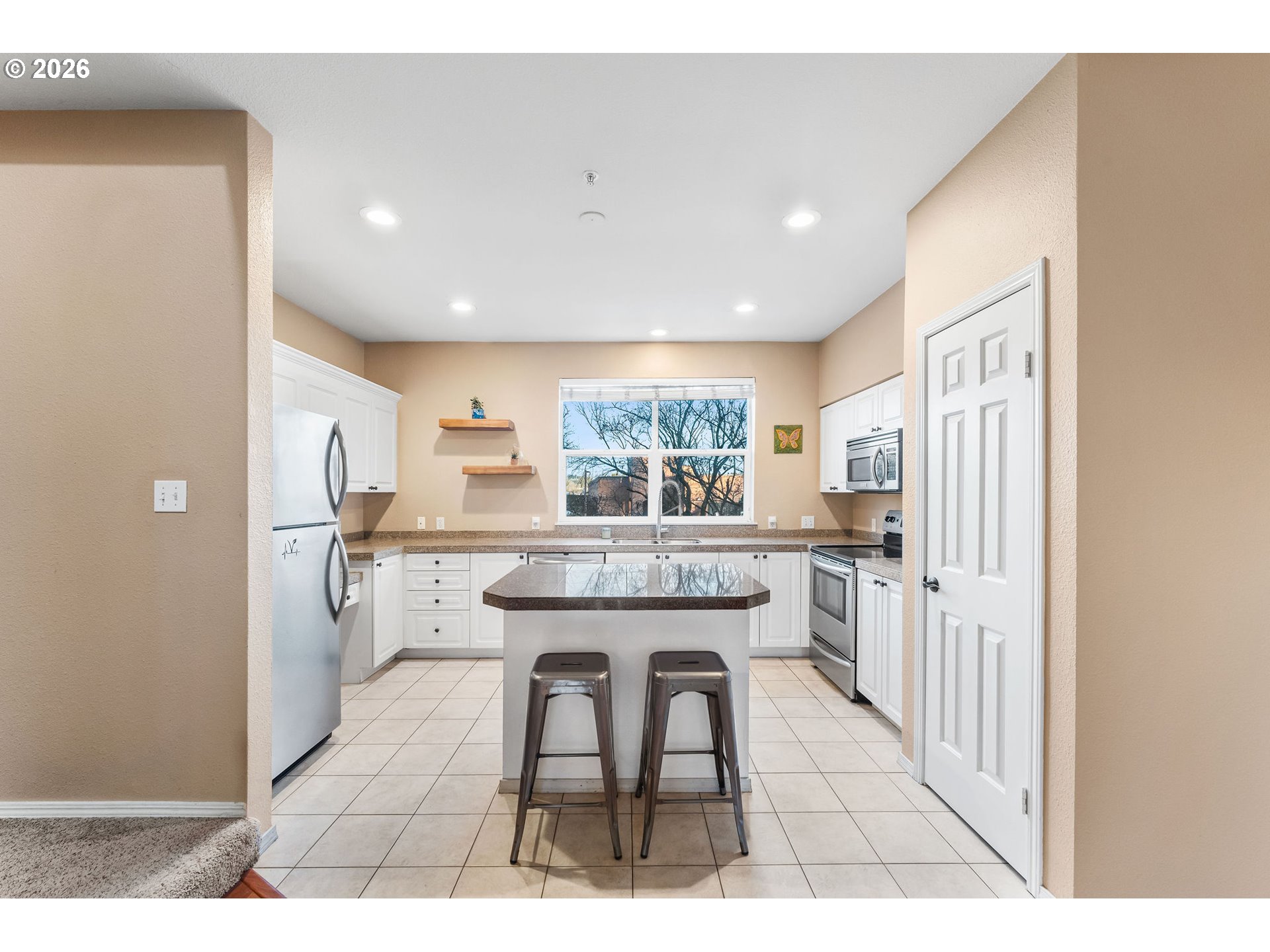 1816 Southeast Cutter Lane Vancouver, WA 98661 - Photo 13 of 43 a kitchen with stainless steel appliances granite countertop a refrigerator and a stove top oven