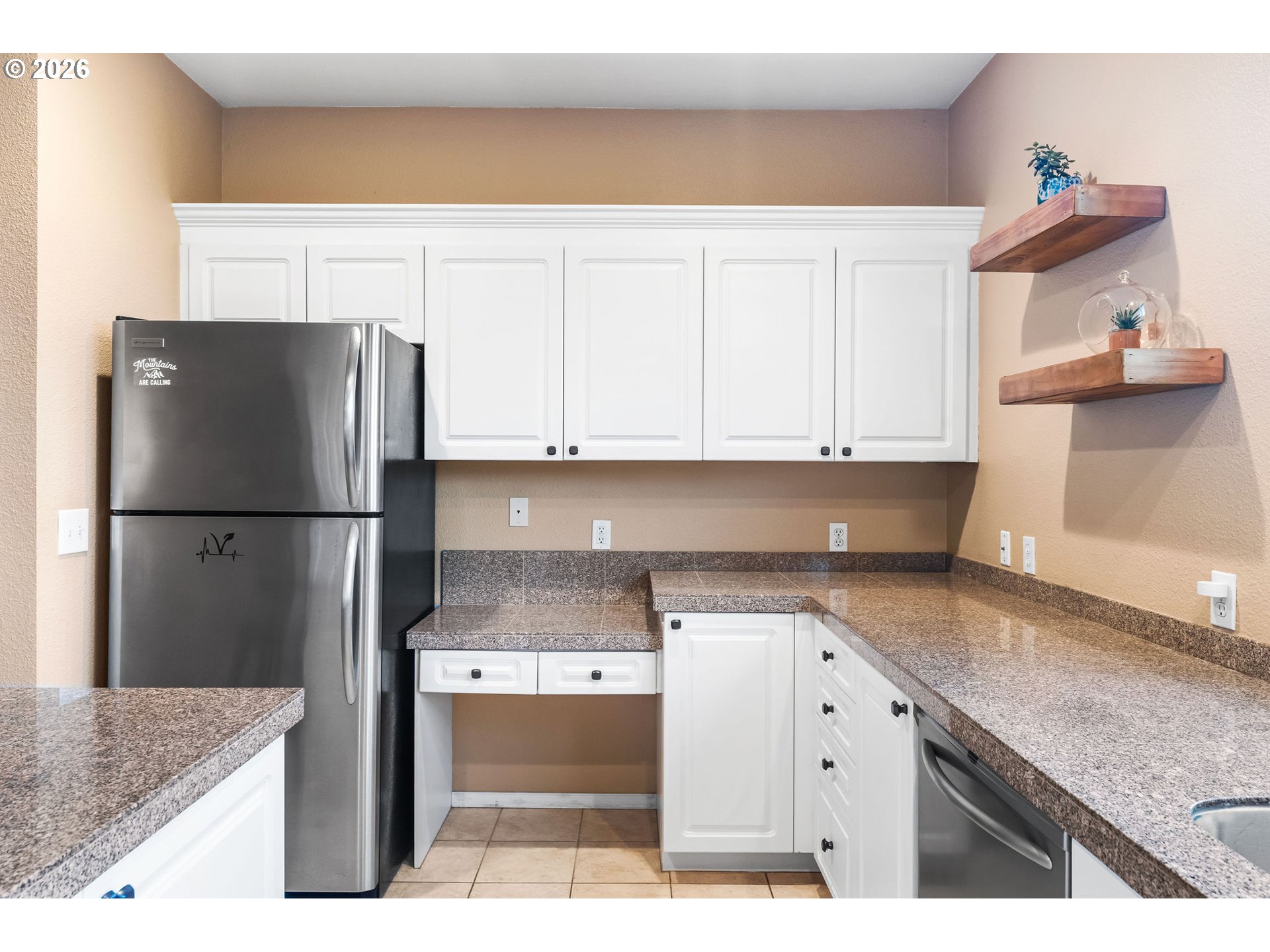 1816 Southeast Cutter Lane Vancouver, WA 98661 - Photo 16 of 43 a kitchen with stainless steel appliances granite countertop a refrigerator sink and cabinets