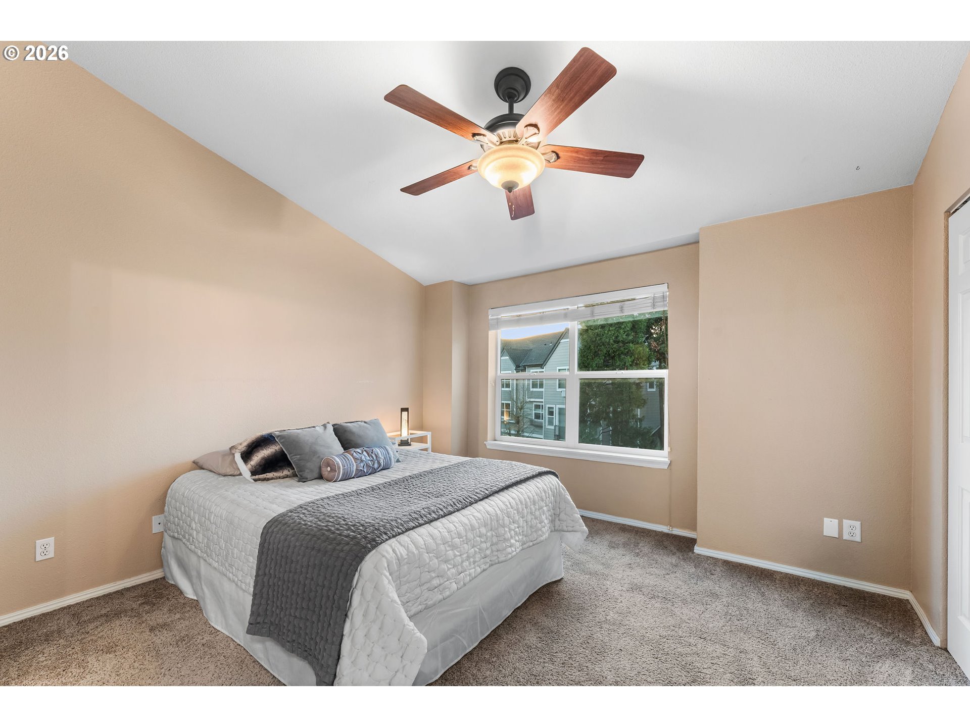 1816 Southeast Cutter Lane Vancouver, WA 98661 - Photo 21 of 43 a bedroom with a bed and window