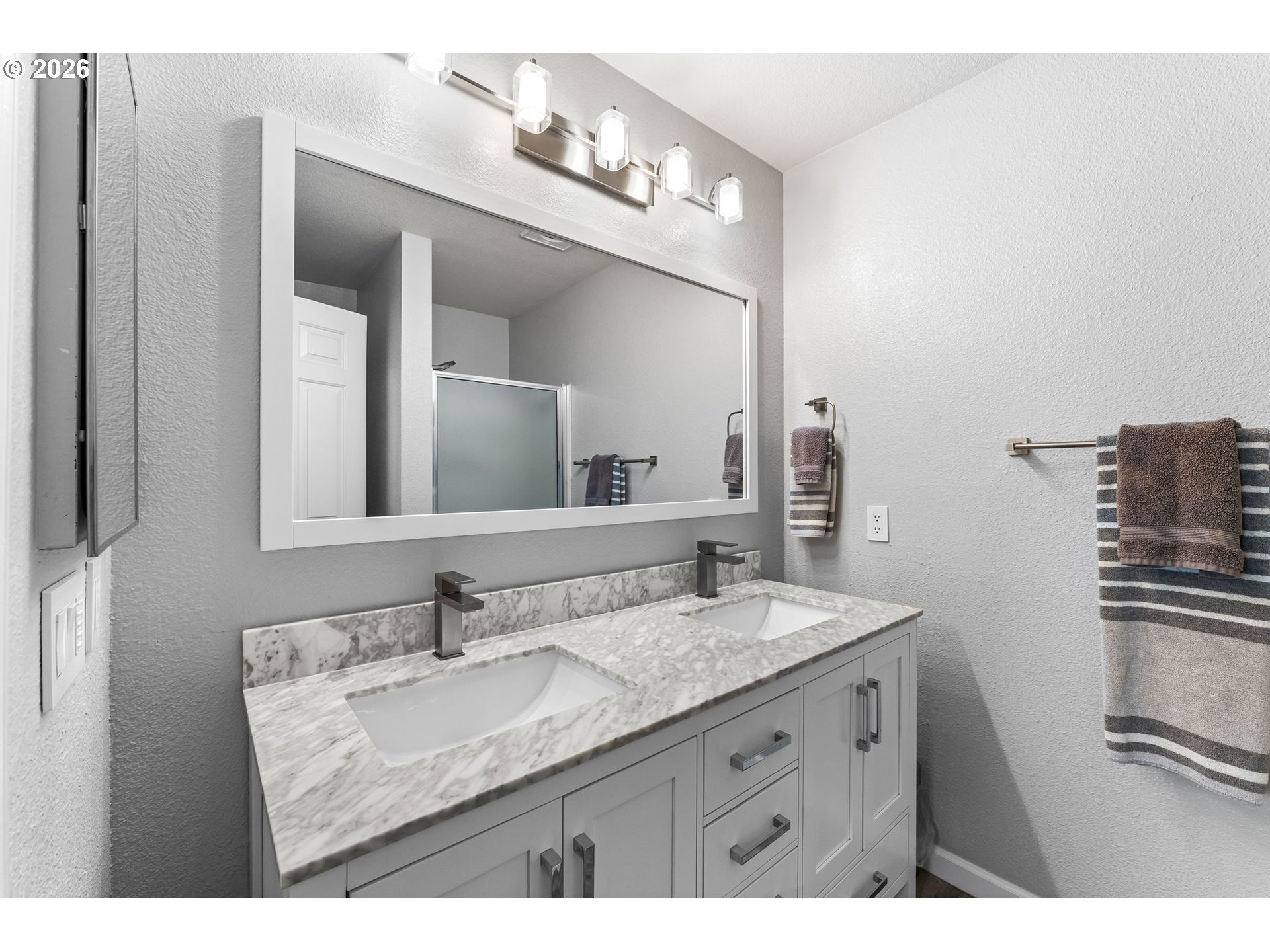 1816 Southeast Cutter Lane Vancouver, WA 98661 - Photo 26 of 43 a bathroom with a granite countertop sink a large mirror and a