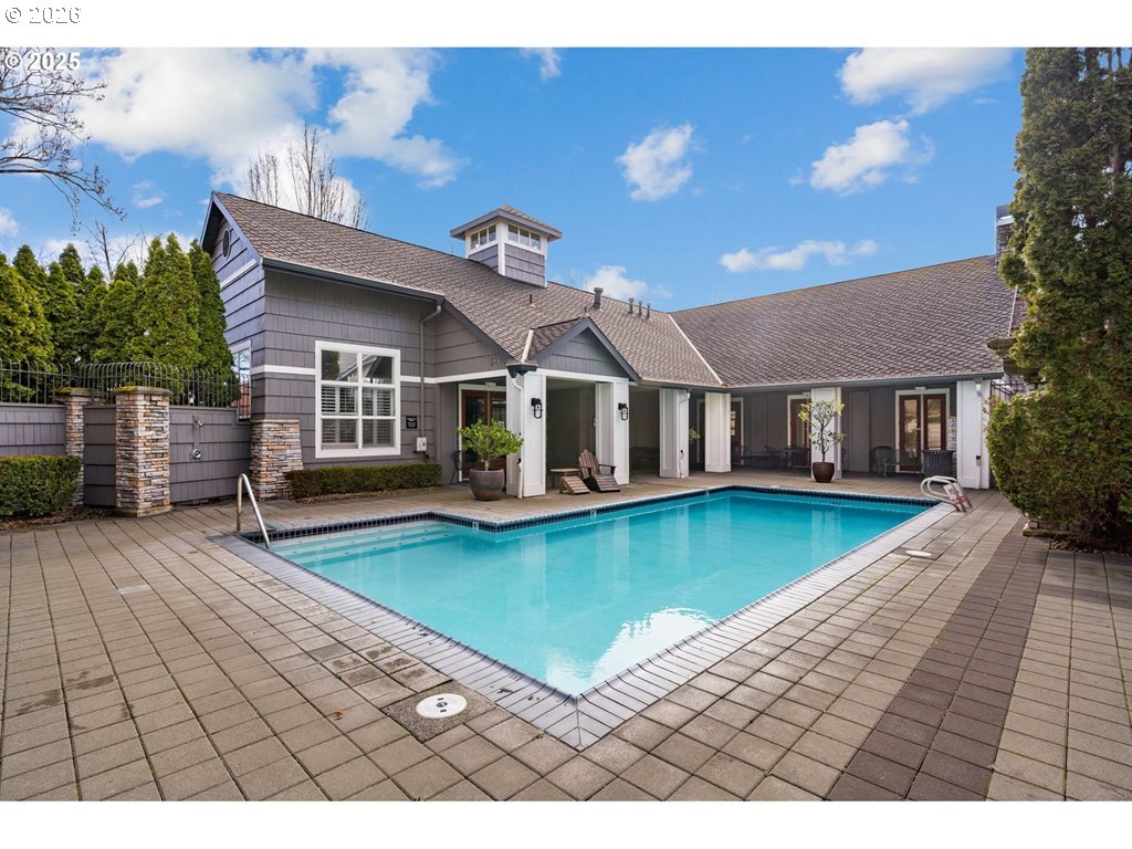 1816 Southeast Cutter Lane Vancouver, WA 98661 - Photo 42 of 43 a view of a house with pool and a yard