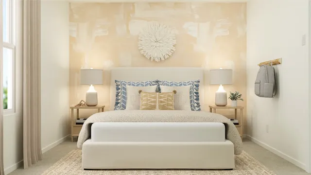 a spacious bedroom with a bed and window