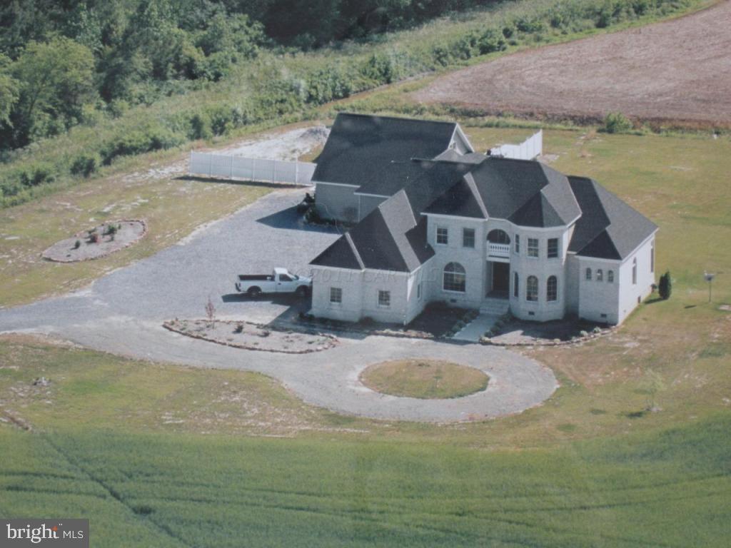 7840 Queponco Road Newark, MD 21841 - Photo 1 of 43 an aerial view of a house with outdoor space