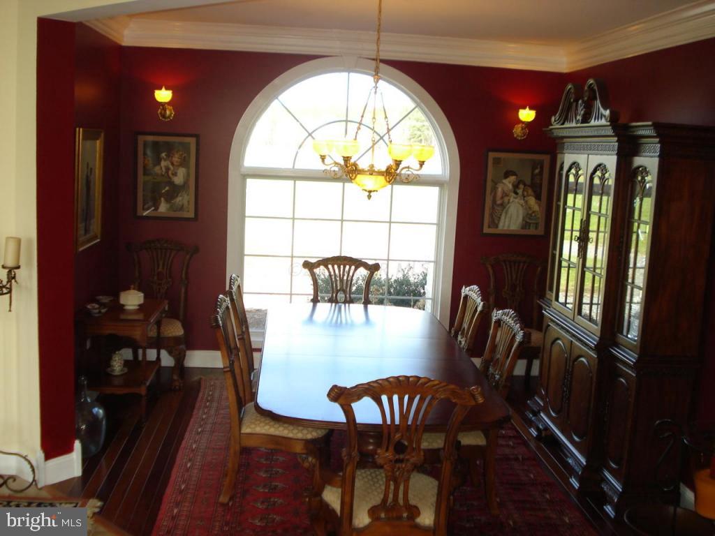 7840 Queponco Road Newark, MD 21841 - Photo 10 of 43 a view of a dining room with furniture window and outside view