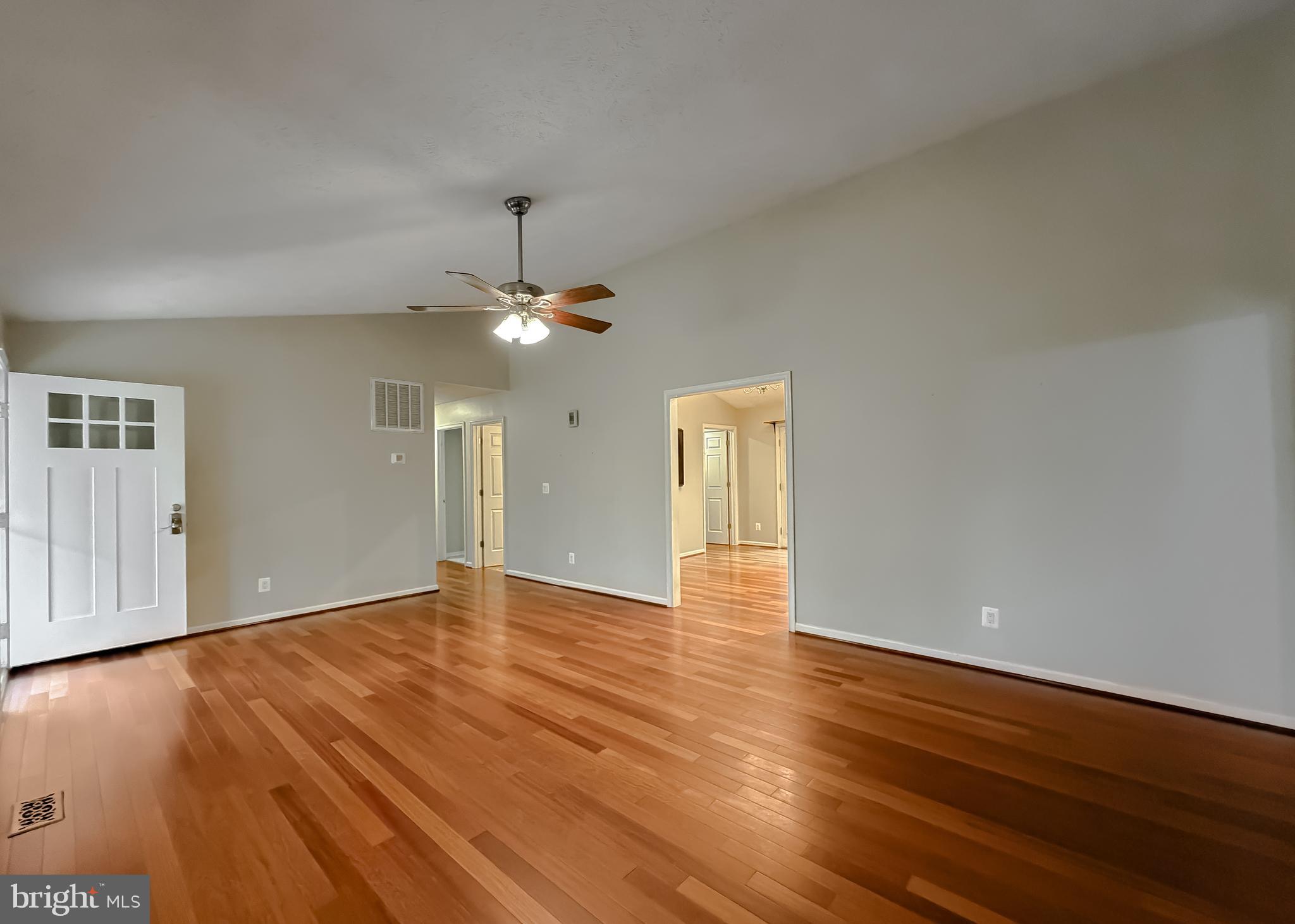 19830 Fall Court Great Mills, MD 20634 - Photo 14 of 47 a view of an empty room with wooden floor and a window