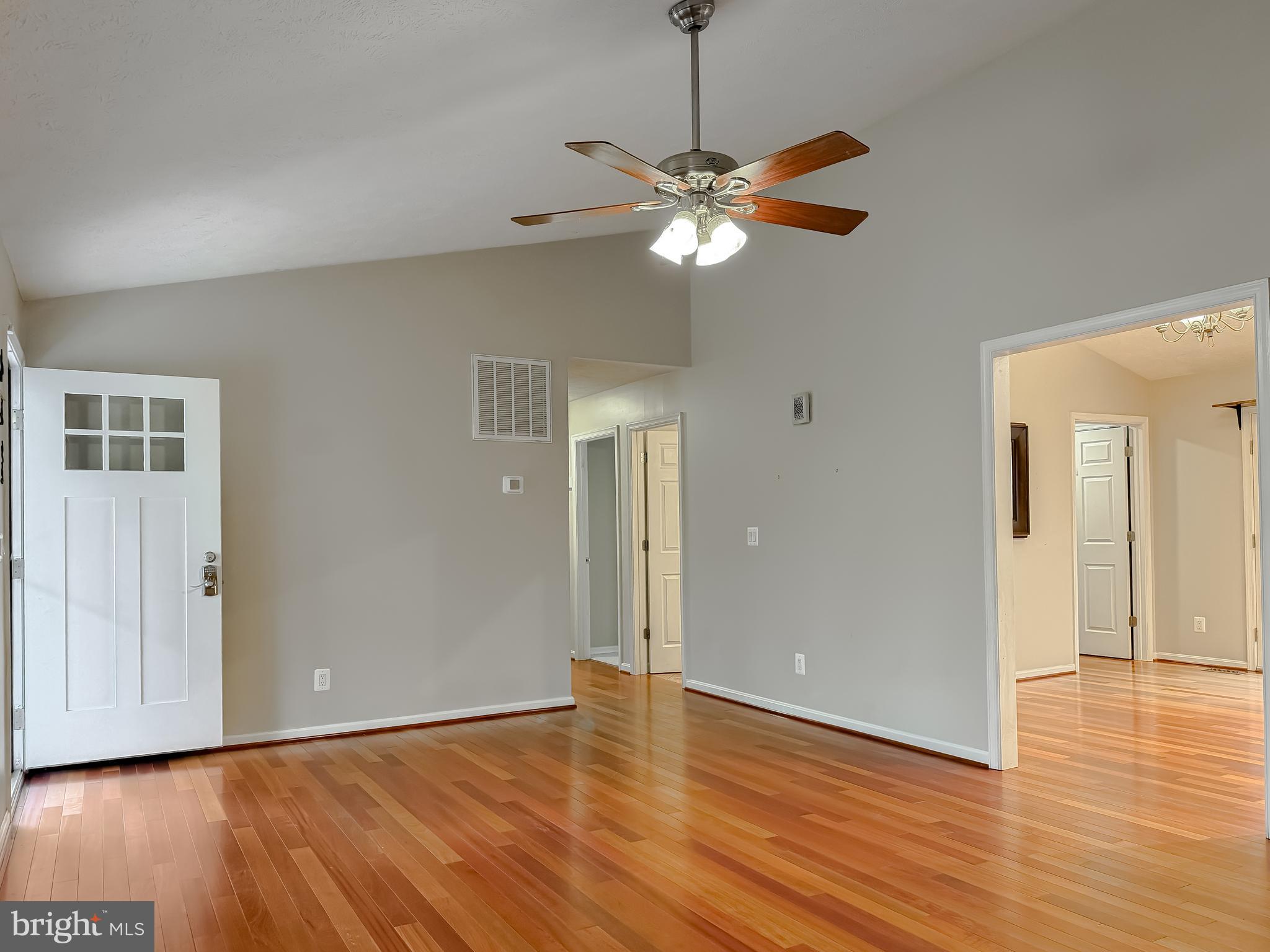 19830 Fall Court Great Mills, MD 20634 - Photo 15 of 47 a view of an empty room with wooden floor