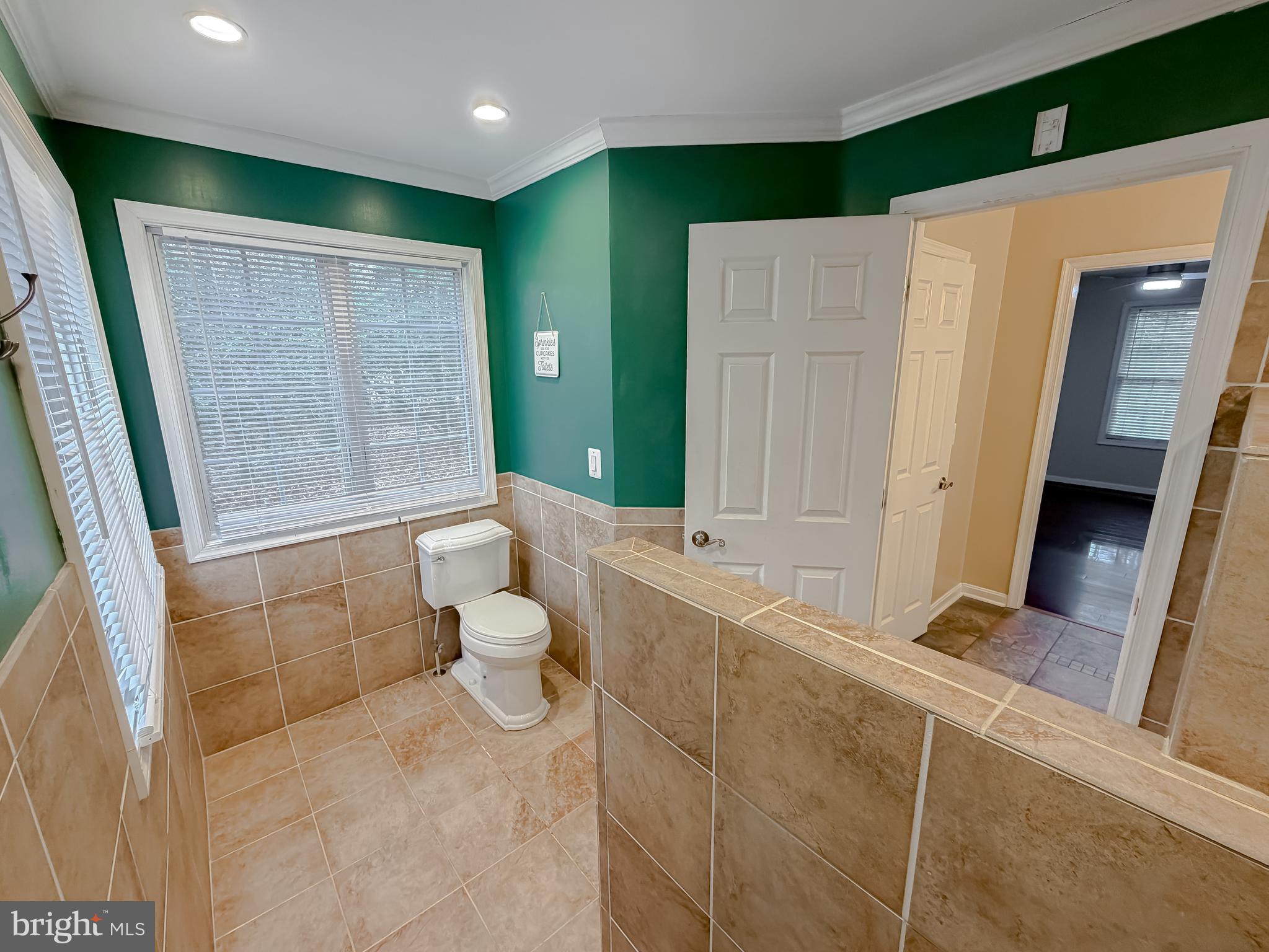 19830 Fall Court Great Mills, MD 20634 - Photo 27 of 47 a bathroom with a toilet sink and mirror