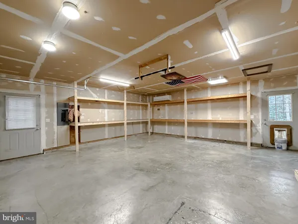 a view of backyard with large trees