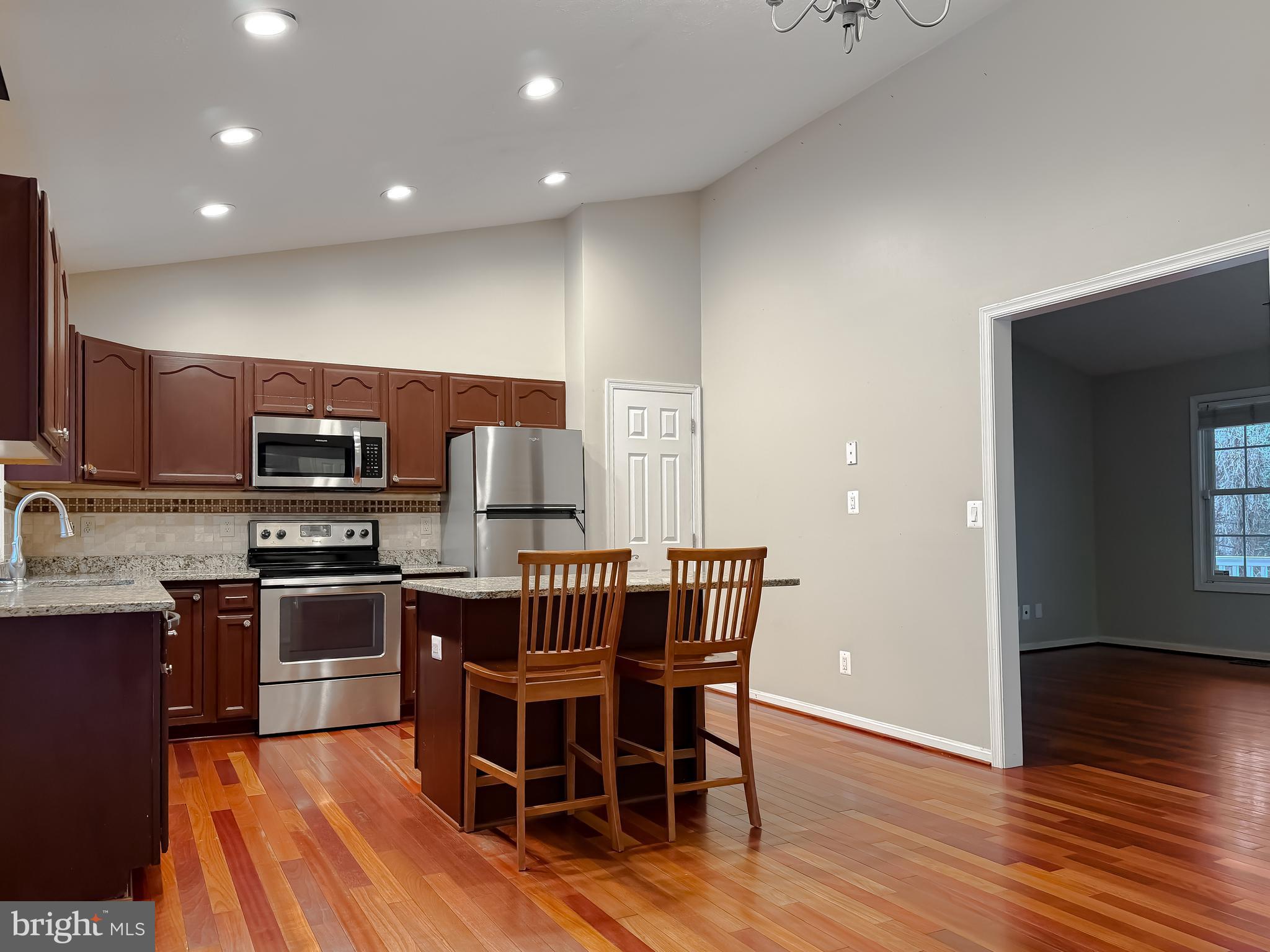 19830 Fall Court Great Mills, MD 20634 - Photo 6 of 47 a kitchen with stainless steel appliances a sink and microwave