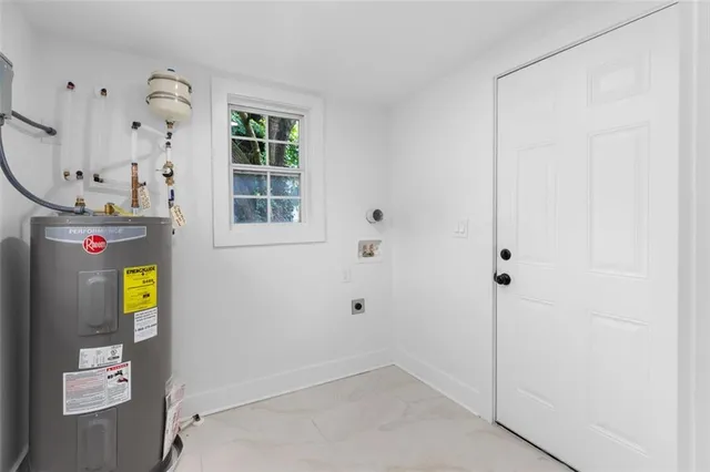 a bathroom with a tub and a window
