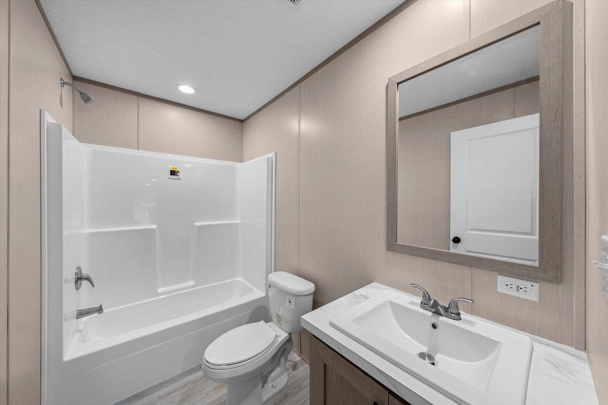 612 Caldwell Road Loudon, TN 37774 - Photo 12 of 16 a bathroom with a sink toilet and shower