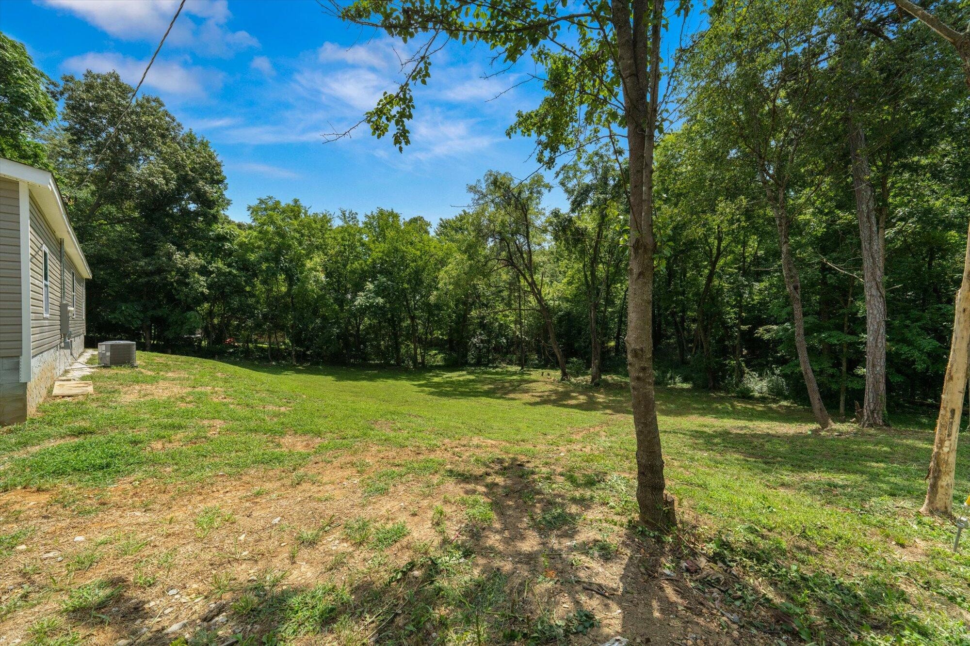 612 Caldwell Road Loudon, TN 37774 - Photo 15 of 16 a view of a field with a tree
