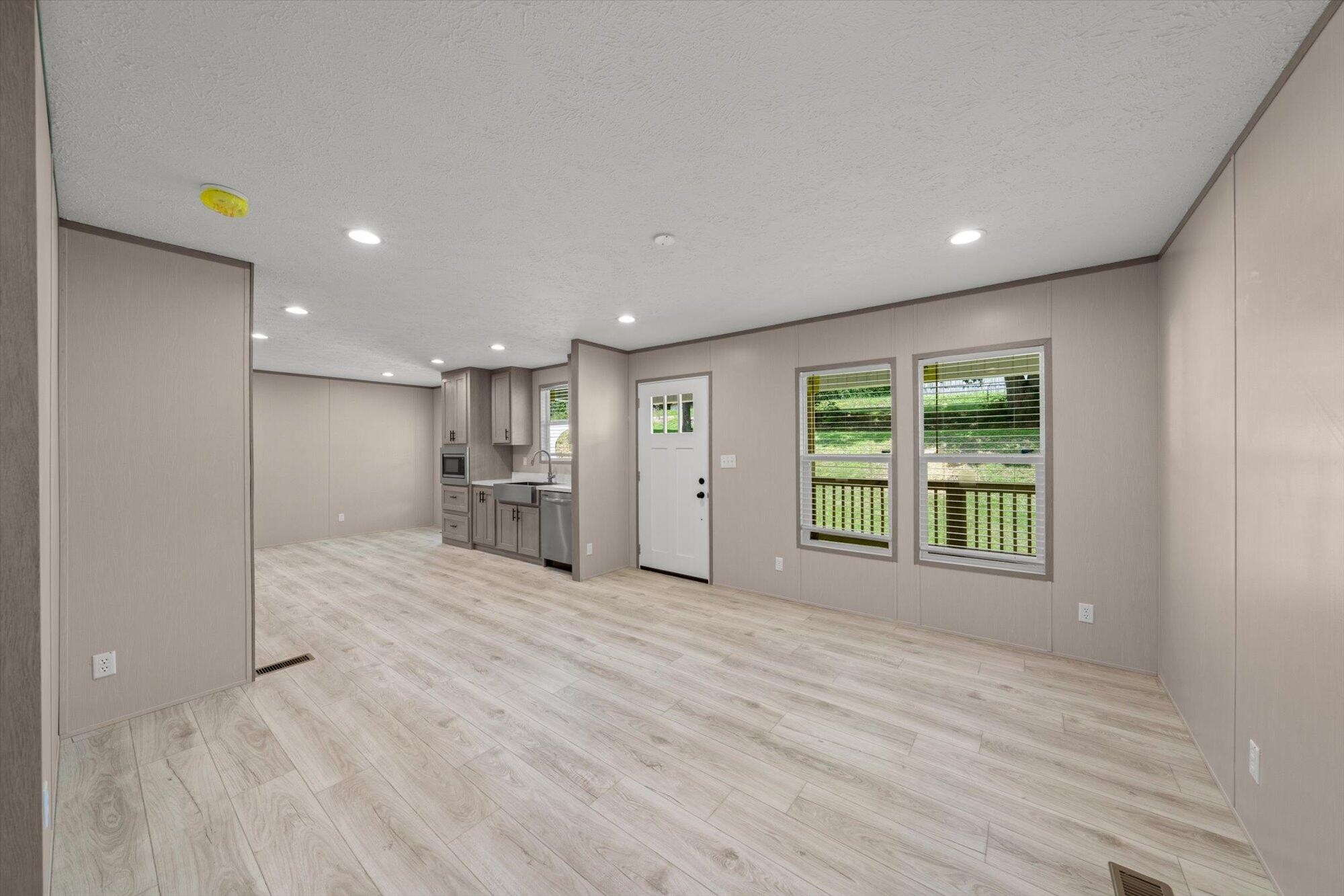 612 Caldwell Road Loudon, TN 37774 - Photo 3 of 16 a view of an empty room with a window