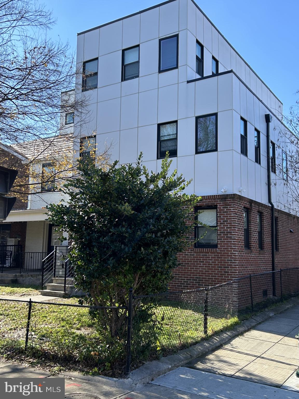 438 19th Street Northeast Washington, DC 20002 - Photo 2 of 4 a front view of a house with garden