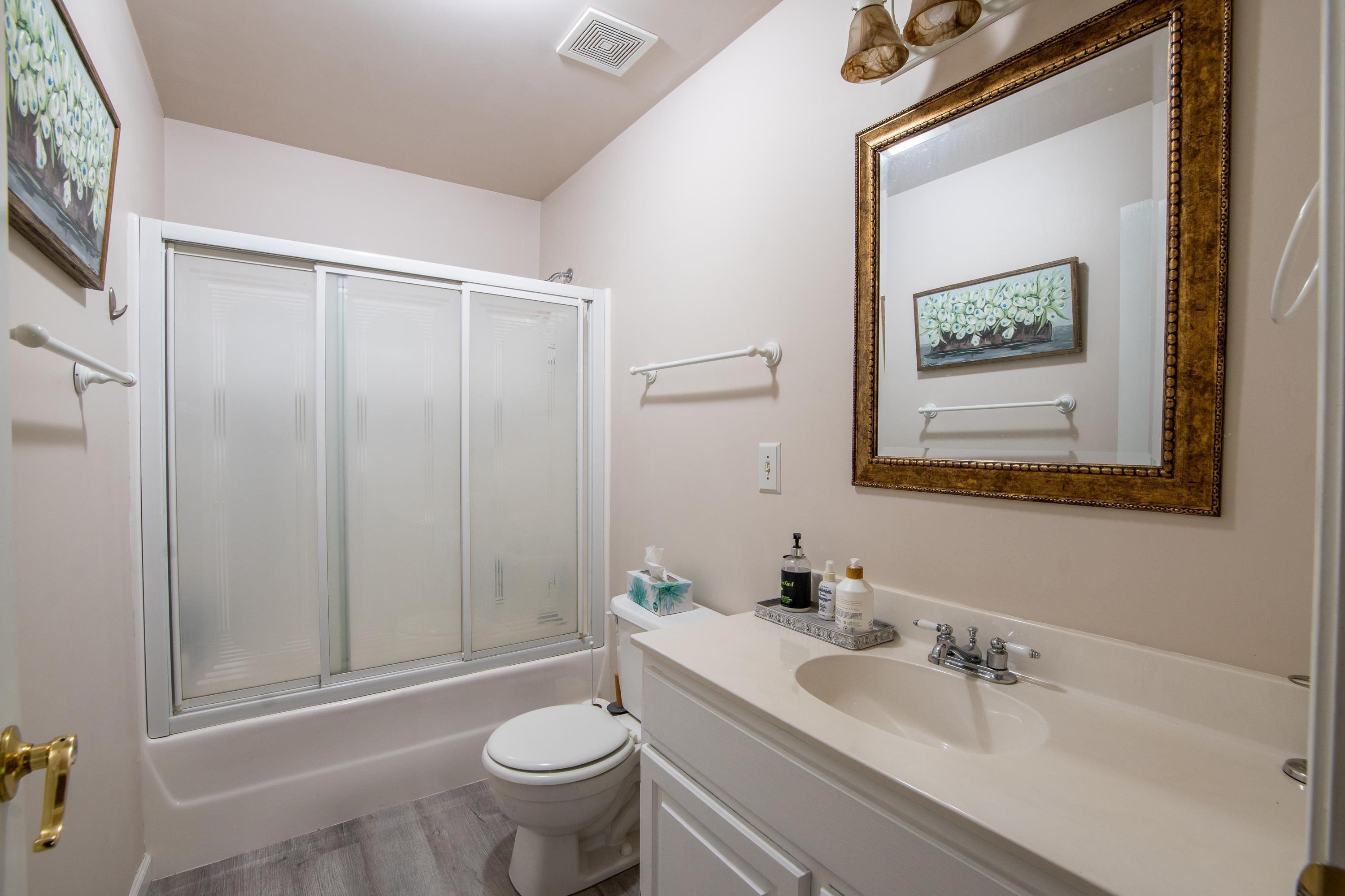 140 Ridge View Savannah, TN 38372 - Photo 22 of 36 a bathroom with a sink and a mirror