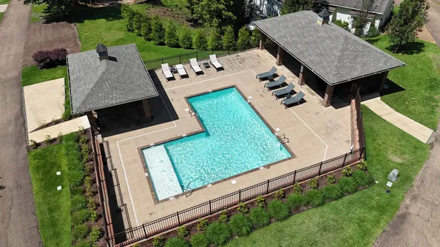 an aerial view of a house having yard