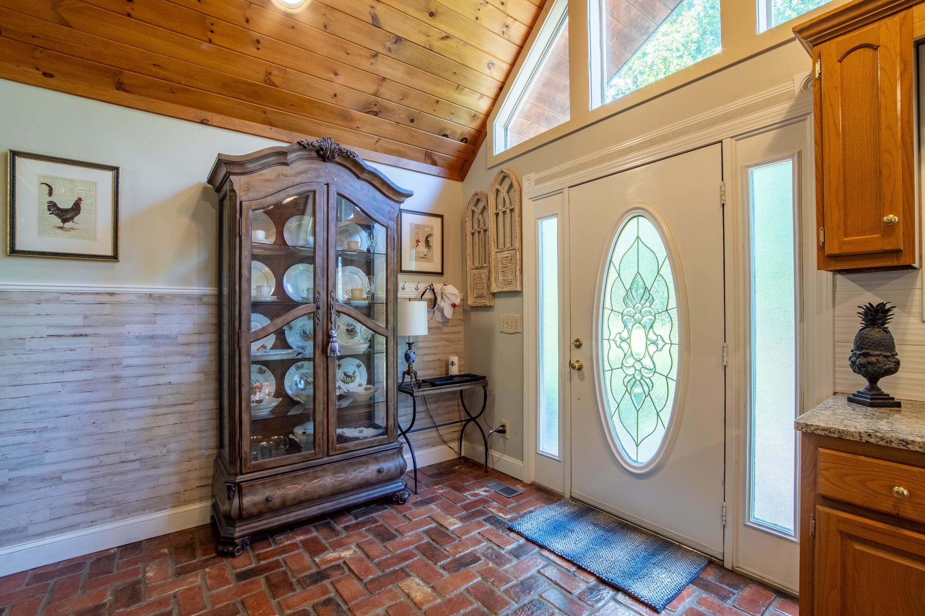 140 Ridge View Savannah, TN 38372 - Photo 8 of 36 a view of front door with washer and dryer