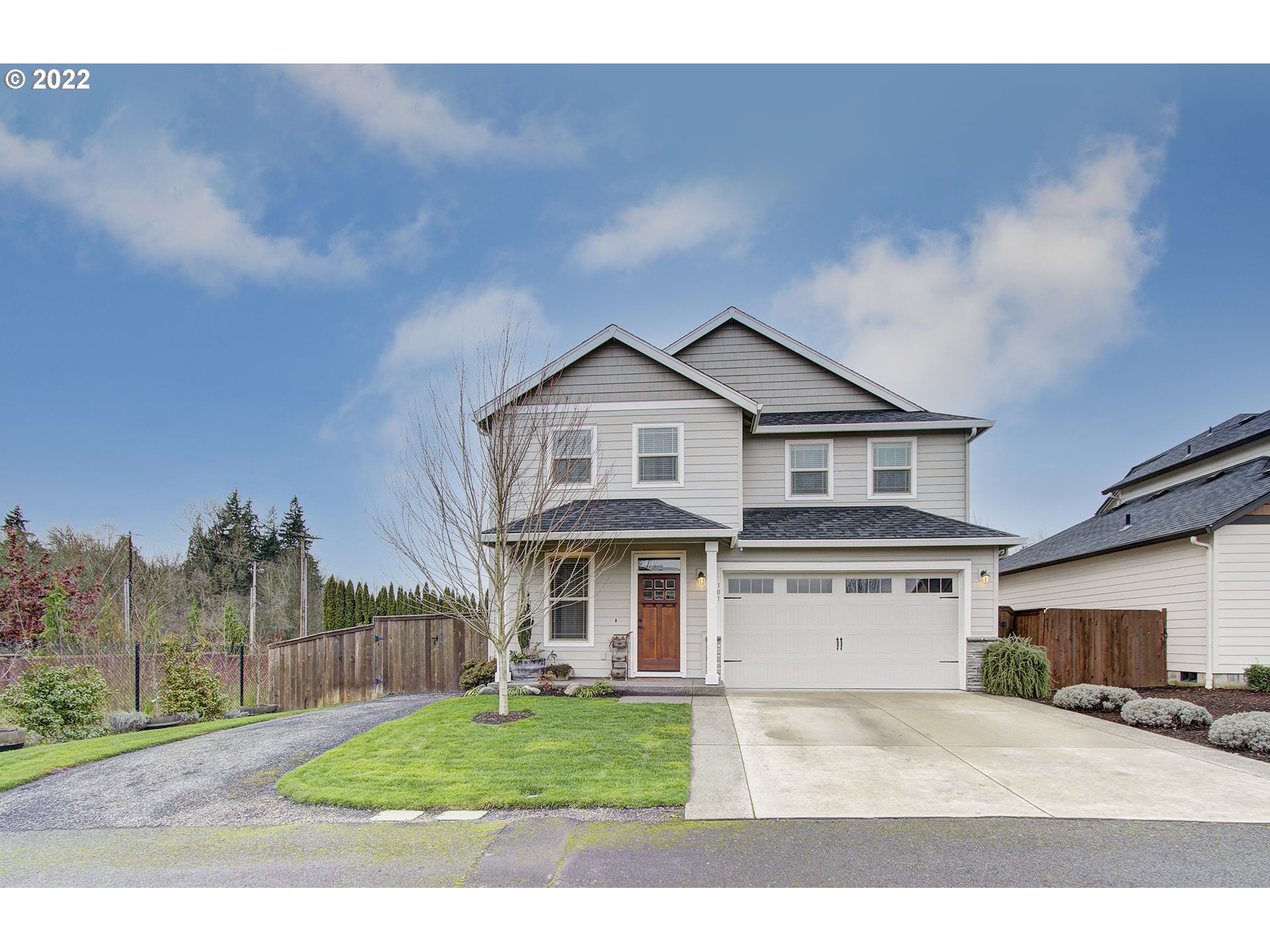 101 North 38th Place Ridgefield, WA 98642 - Photo 1 of 32 a view of a yard in front view of a house