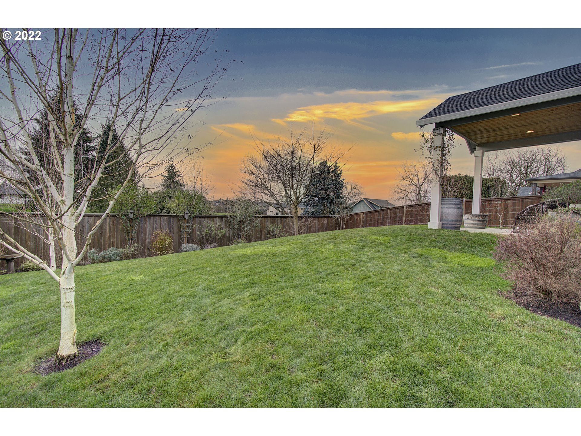 101 North 38th Place Ridgefield, WA 98642 - Photo 26 of 32 a backyard of a house with lots of green space