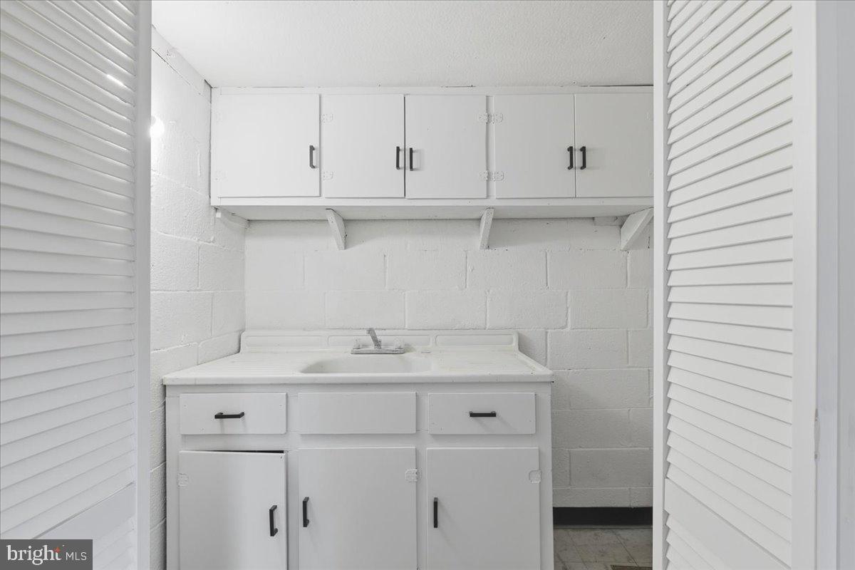 9704 Lorain Avenue Silver Spring, MD 20901 - Photo 26 of 26 a view of cabinets with sink