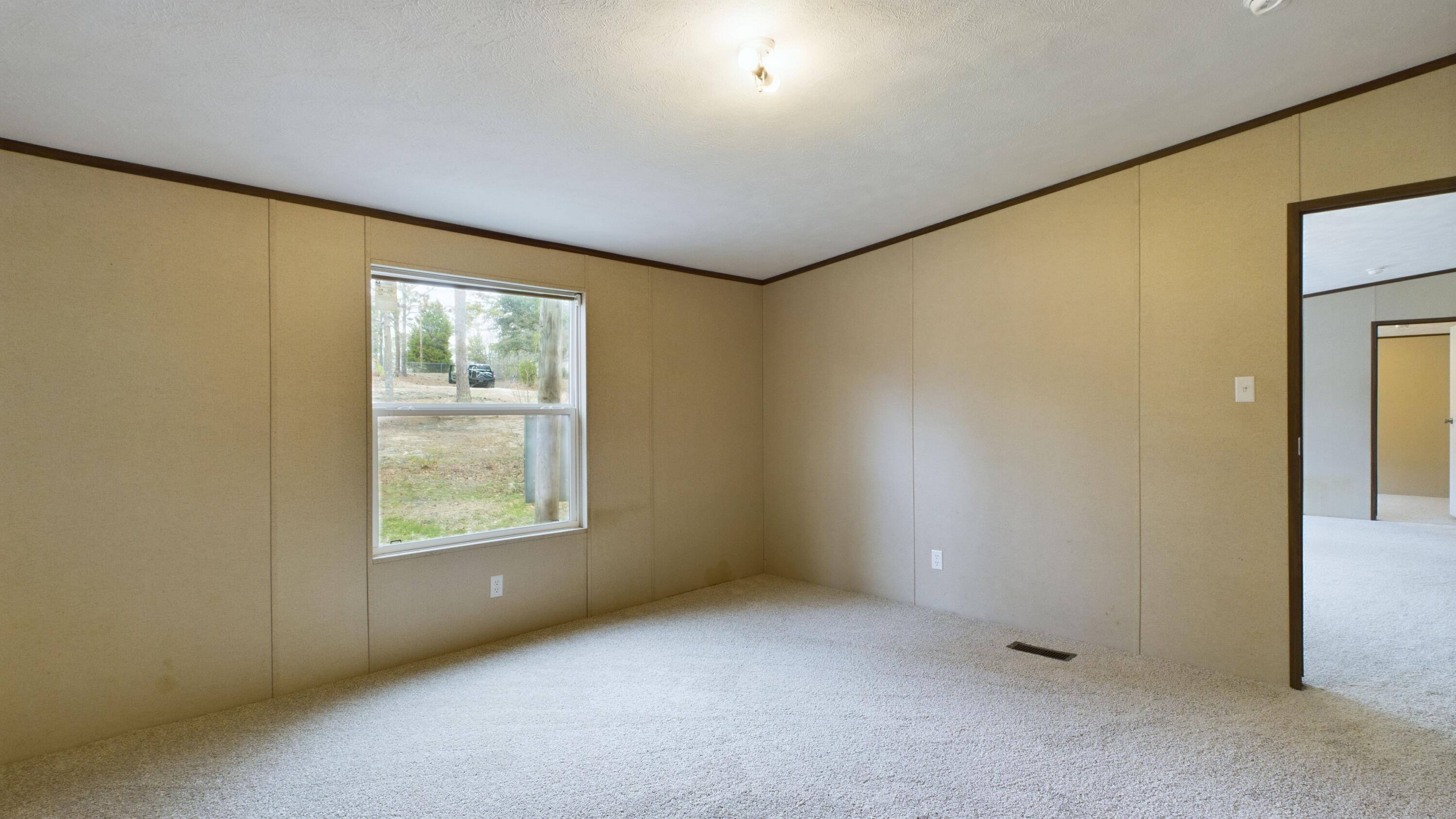 433 Bounty Road Eutawville, SC 29048 - Photo 8 of 20 Master Bedroom off Living Room