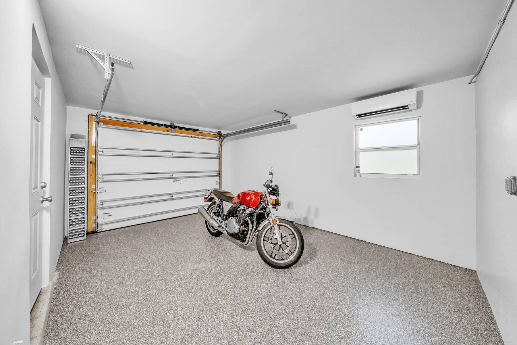 1970 Northeast 32nd Street Lighthouse Point, FL 33064 - Photo 40 of 58 Garage with epoxy flooring
