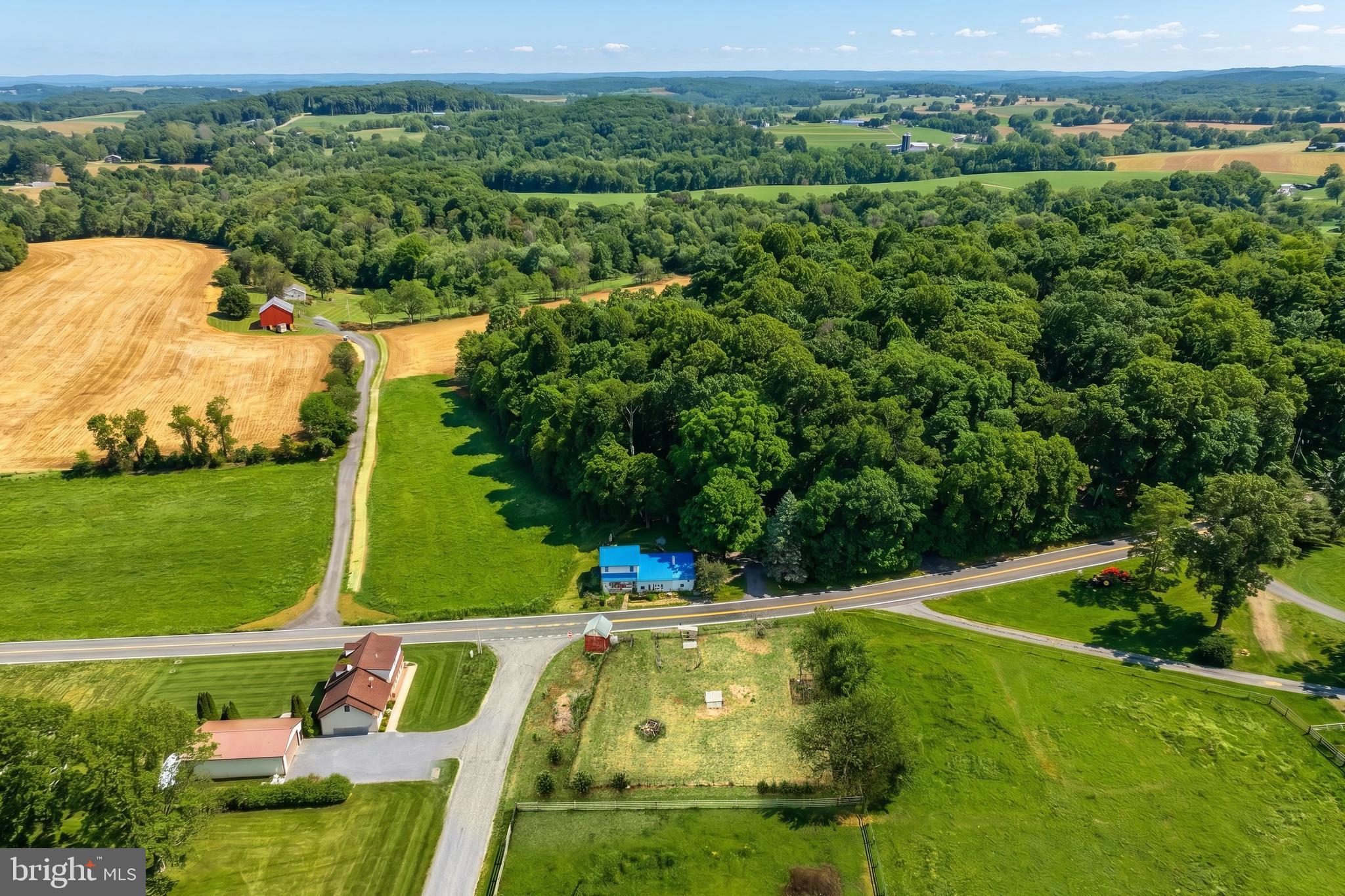 1111 Richmond Road Red Lion, PA 17356 - Photo 50 of 57 an aerial view of a house with a yard