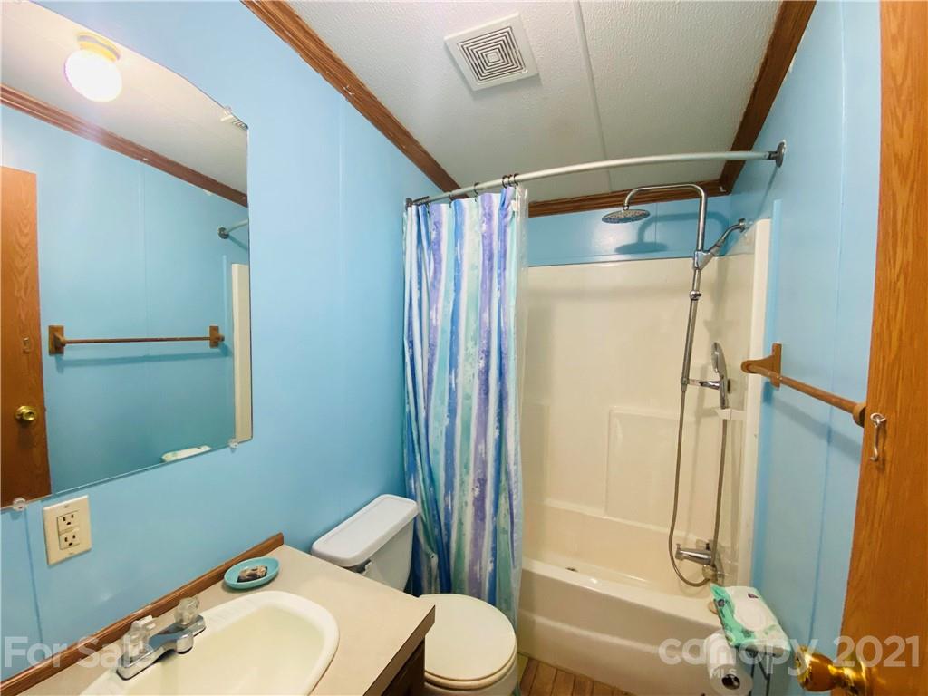 46 Austin Road Clyde, NC 28721 - Photo 15 of 20 a bathroom with a sink and toilet