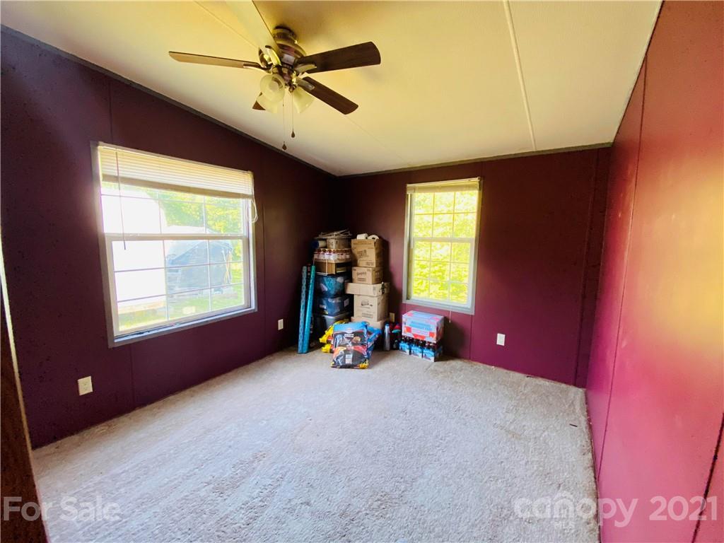 46 Austin Road Clyde, NC 28721 - Photo 16 of 20 a view of a room with furniture and windows