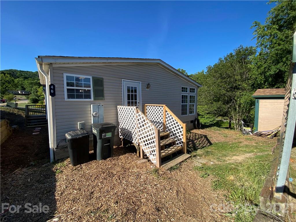 46 Austin Road Clyde, NC 28721 - Photo 3 of 20 a house view with a backyard space