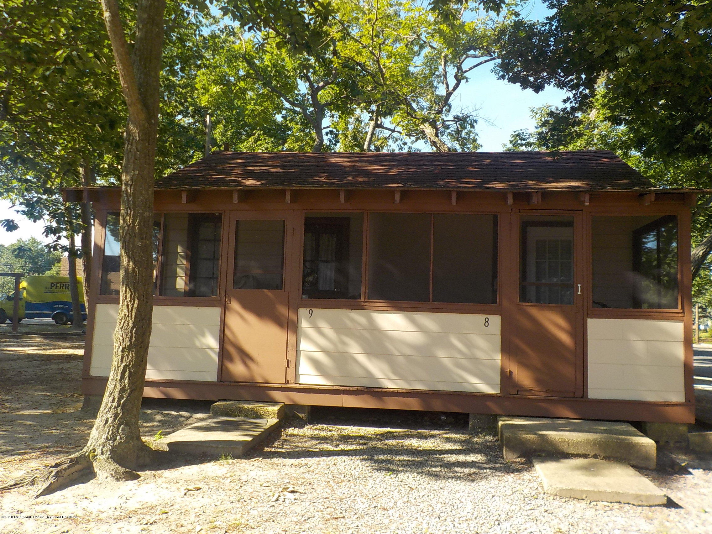 2613 Route 88 Point Point Pleasant, NJ 08742 - Photo 12 of 14 a view of house with tree in front of it