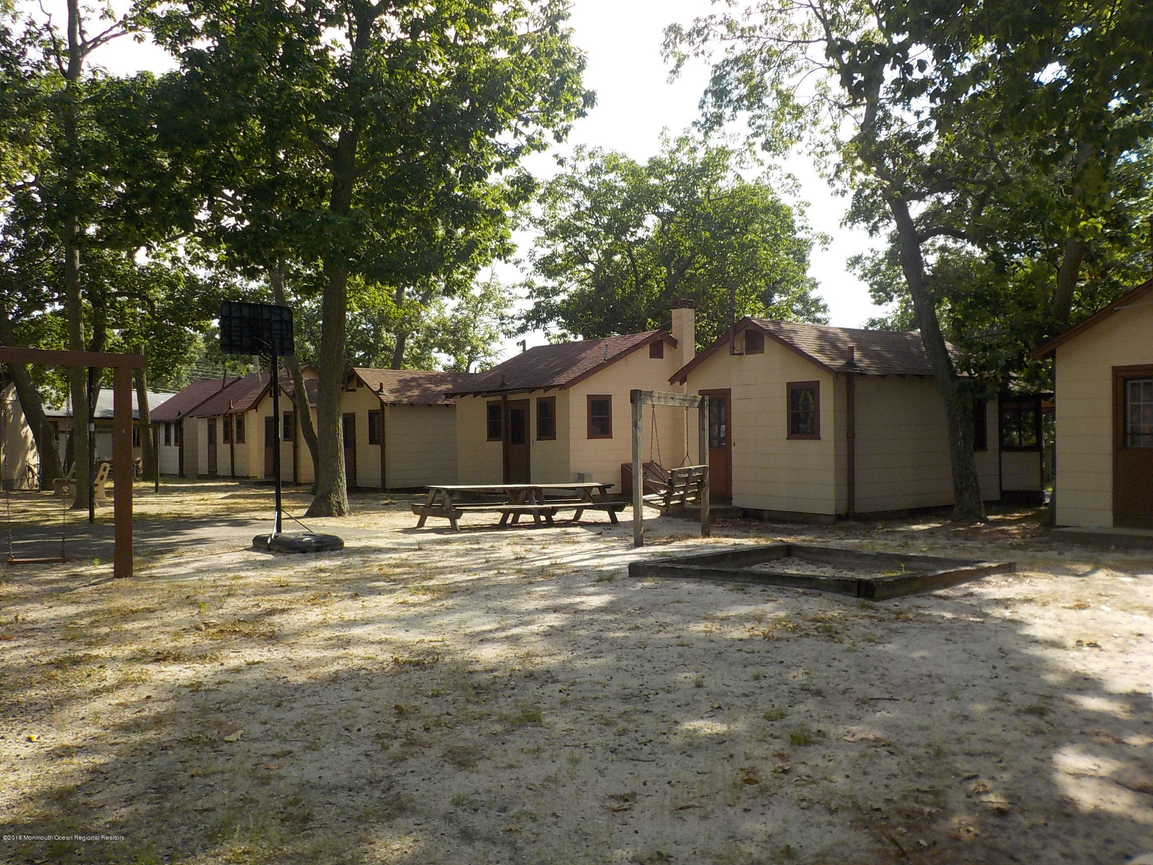 2613 Route 88 Point Point Pleasant, NJ 08742 - Photo 6 of 14 a view of a house with a yard and large tree
