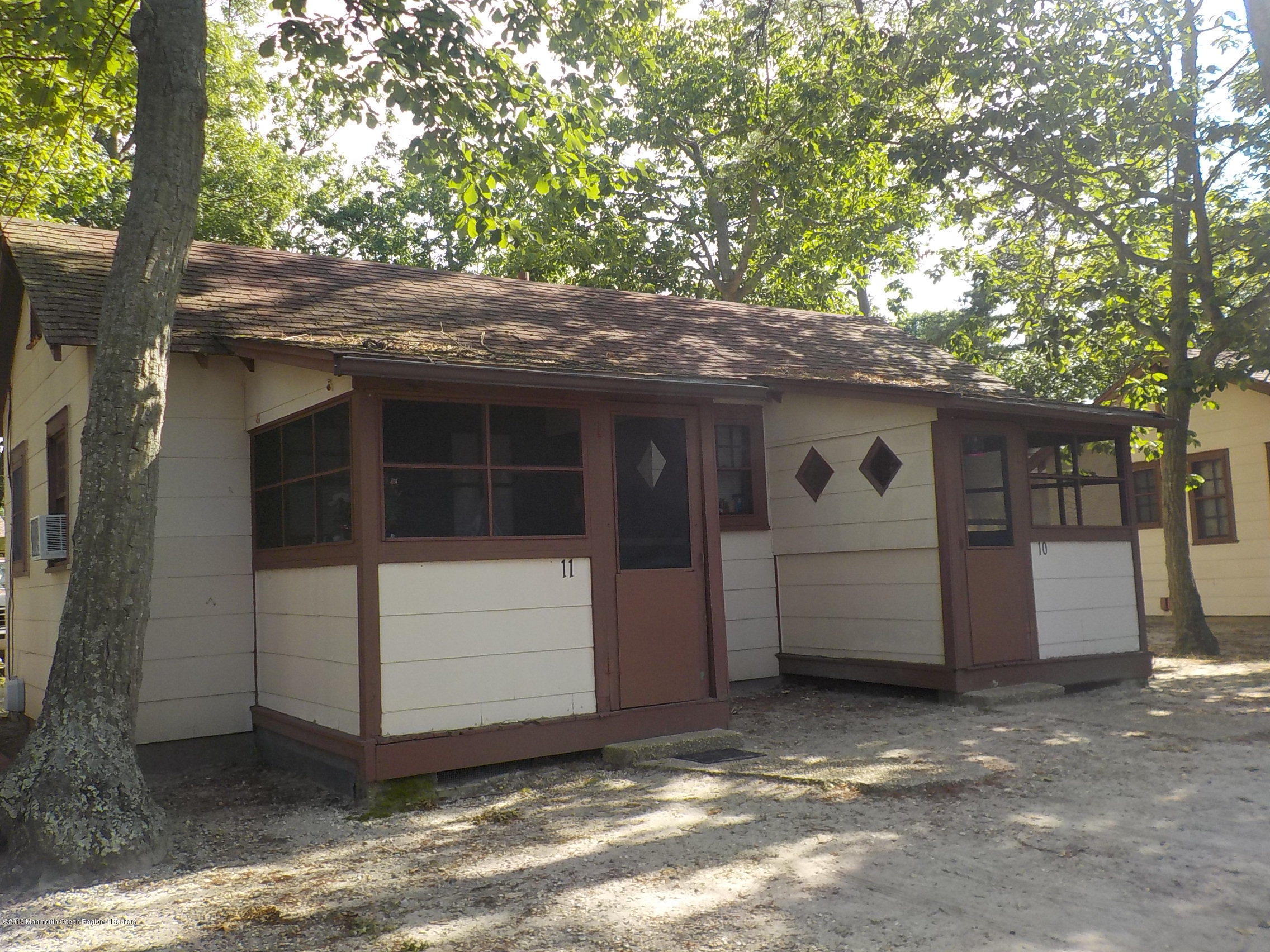 2613 Route 88 Point Point Pleasant, NJ 08742 - Photo 10 of 14 a view of a house with a large tree