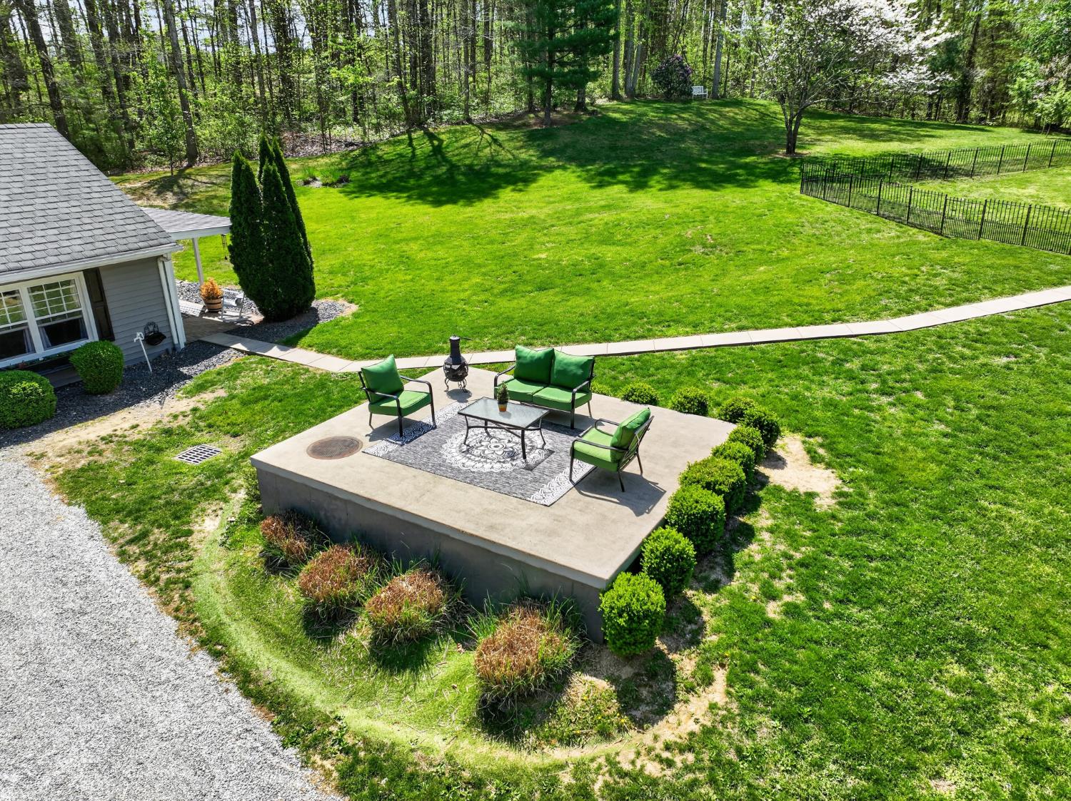 2179 Webb Road Brookville, IN 47012 - Photo 64 of 84 The top of the cistern, partially buried in the yard, provides a pretty and practical sunny patio between the house and garage.