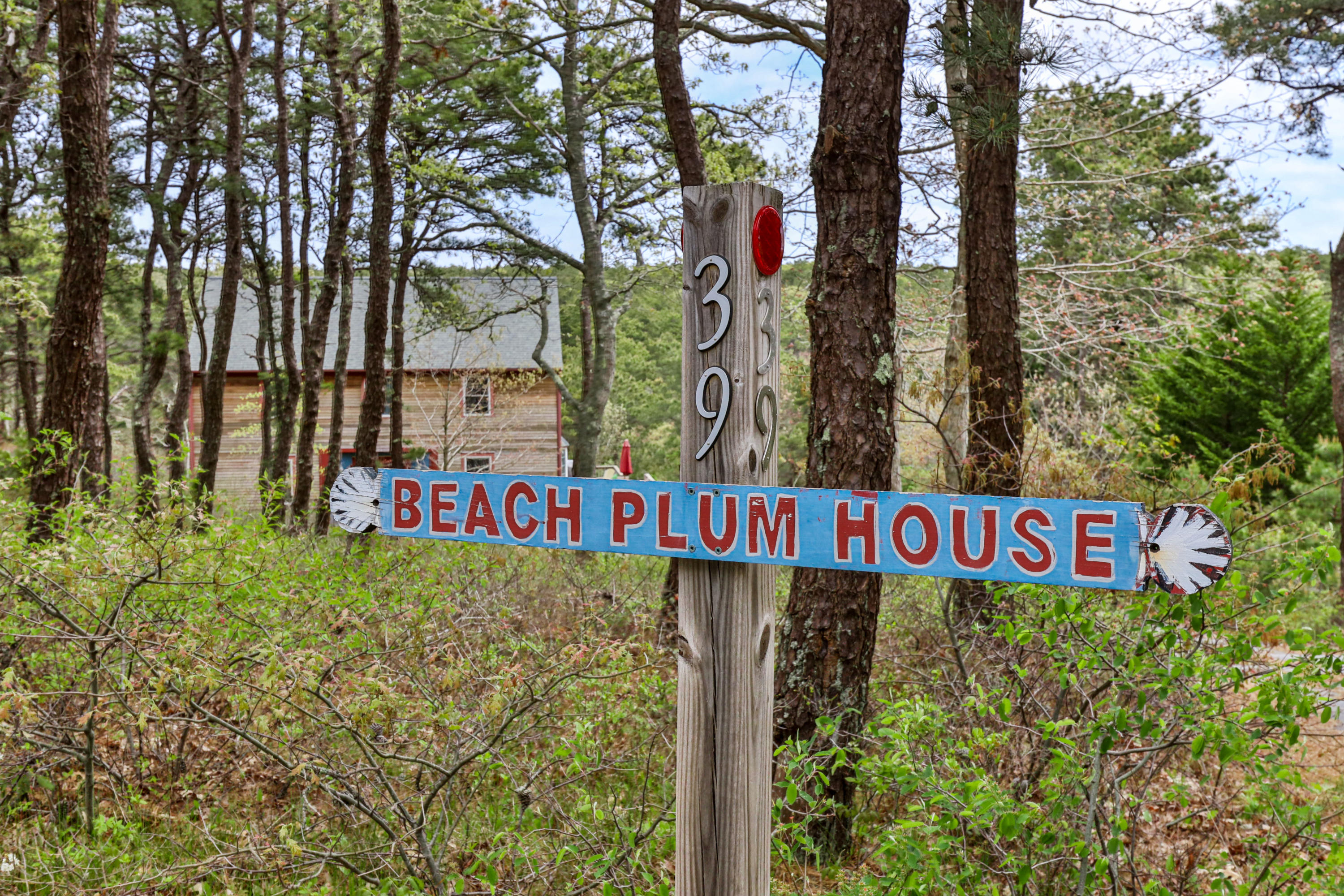 39 South Highland Road Truro, MA 02666 - Photo 2 of 46 a street sign that is on a pole