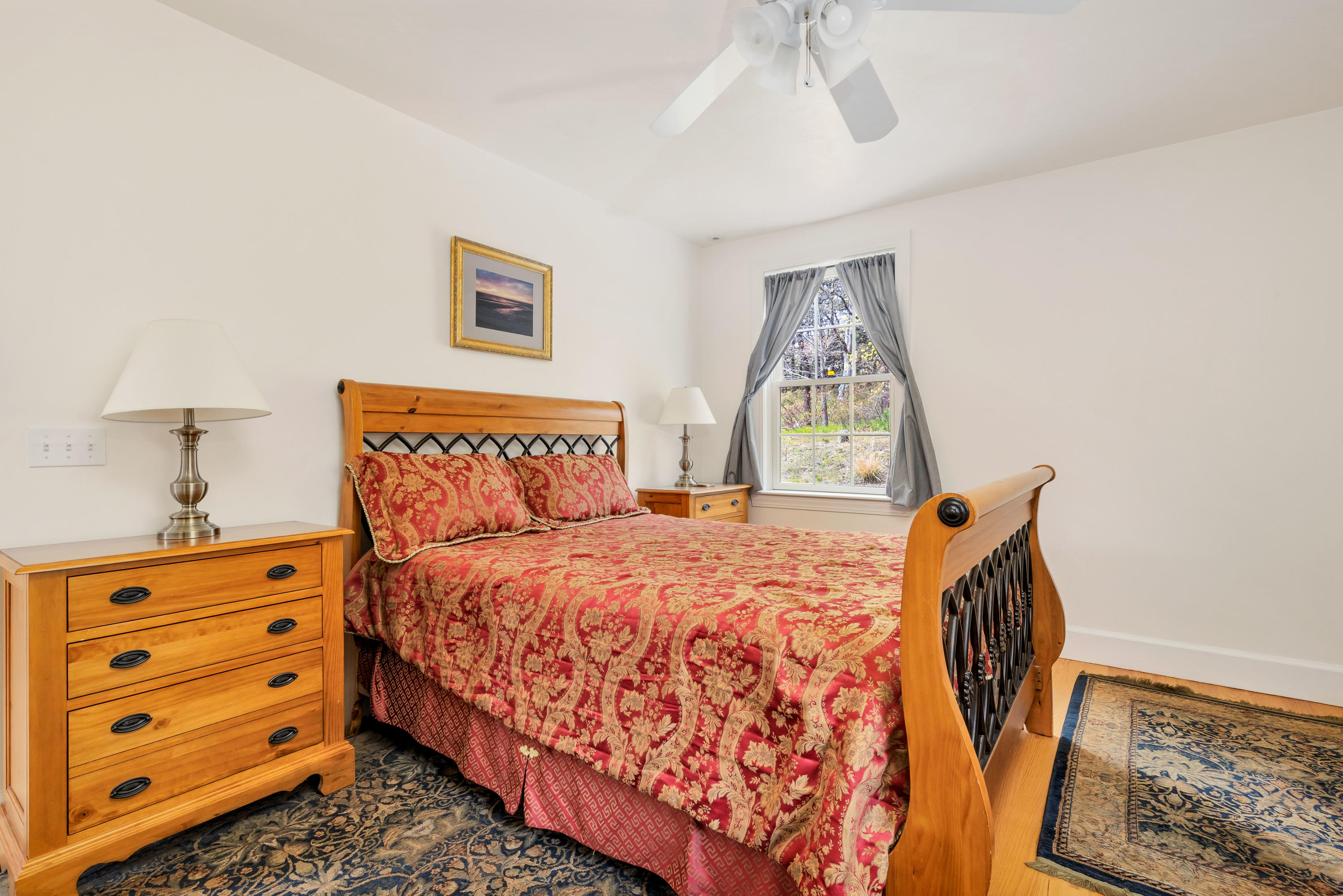 39 South Highland Road Truro, MA 02666 - Photo 21 of 46 a bedroom with a bed window and dresser