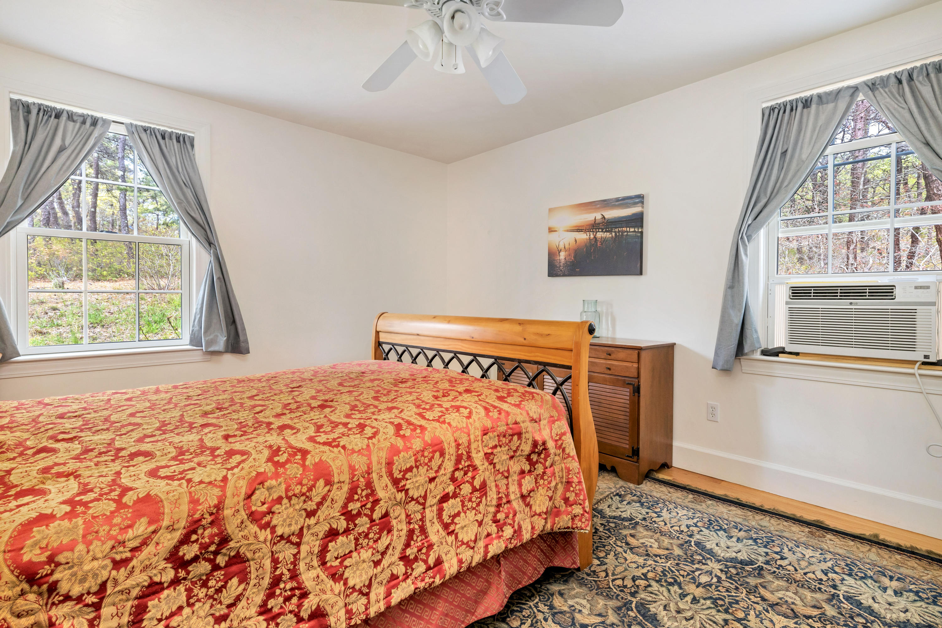 39 South Highland Road Truro, MA 02666 - Photo 22 of 46 a bedroom with a bed and a window