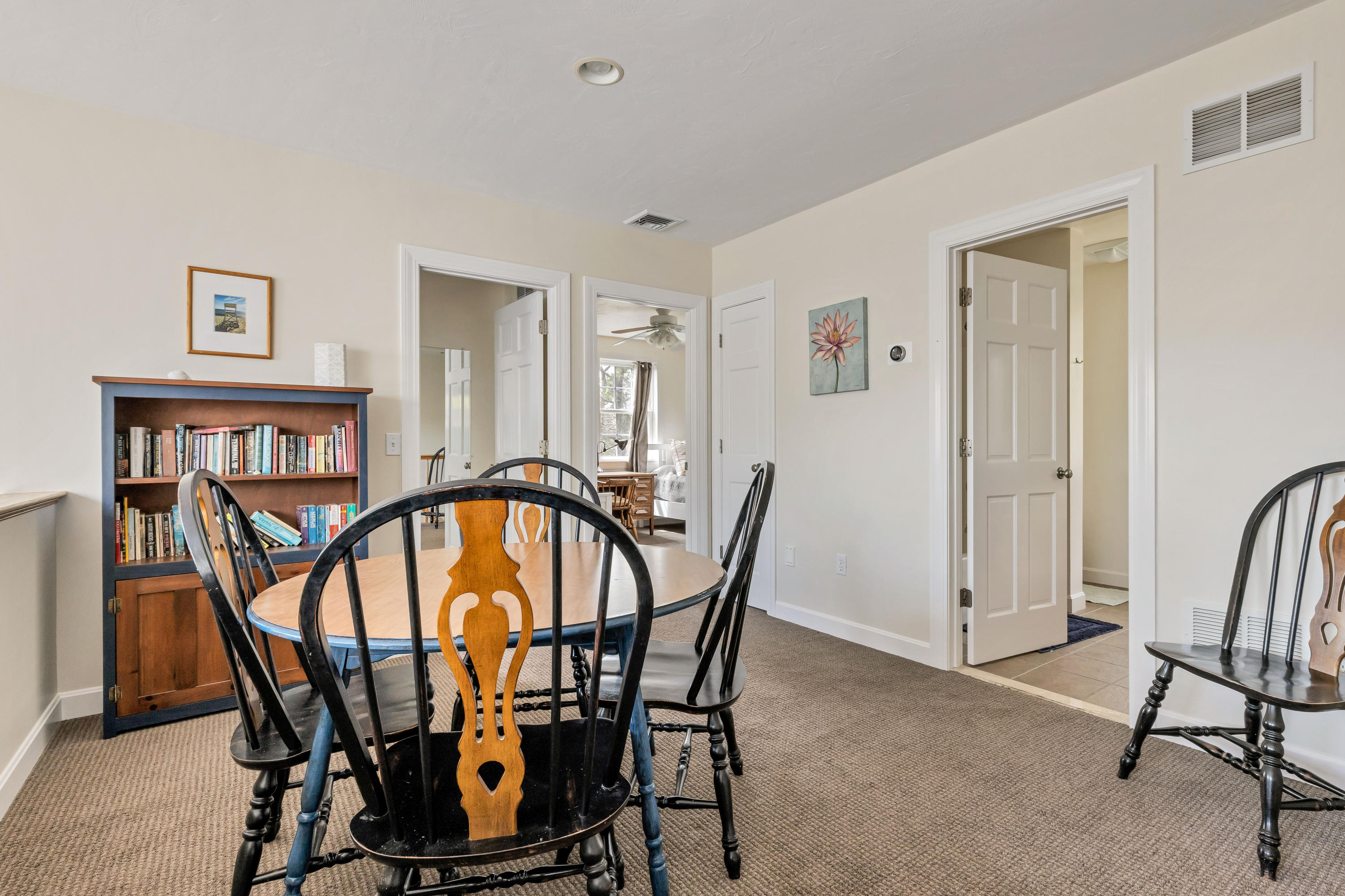 39 South Highland Road Truro, MA 02666 - Photo 24 of 46 a view of a dining room with furniture and a window