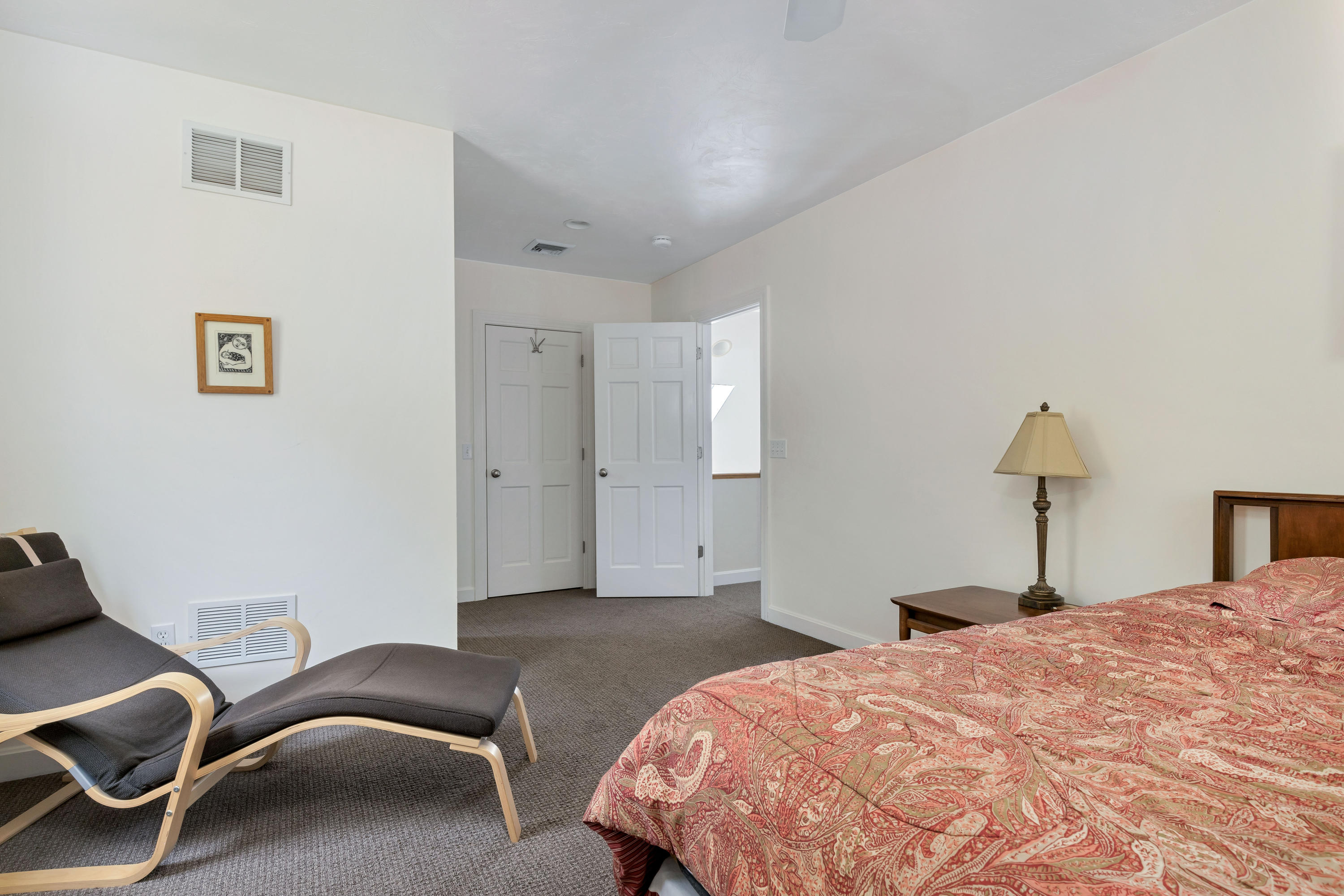39 South Highland Road Truro, MA 02666 - Photo 26 of 46 a bedroom with a bed and a chair